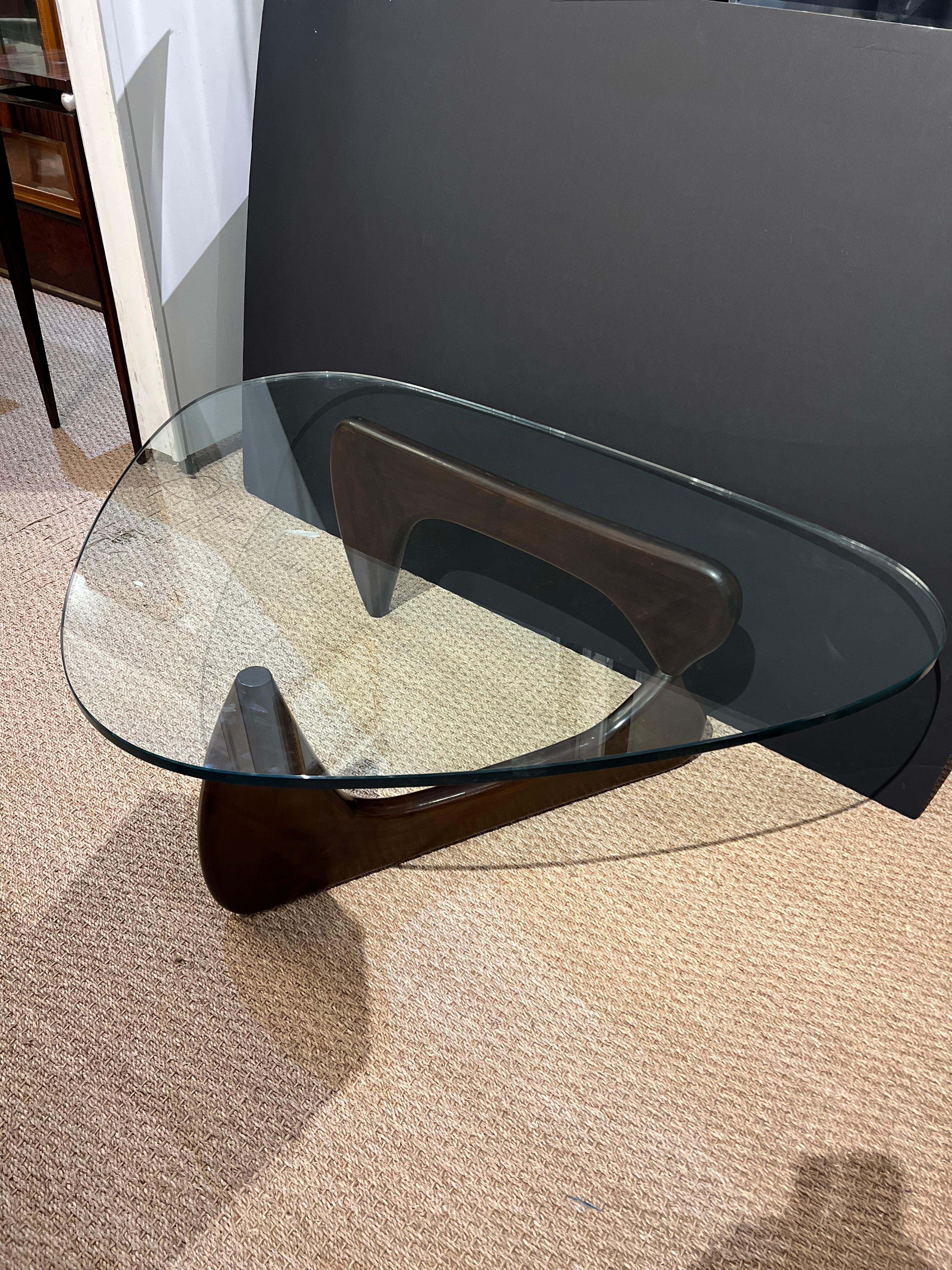 Japanese Coffee Table in Walnut and Glass

Coffee table made in the style of Isamu Noguchi, Japanese-American artist and designer. The supporting base was made out of walnut wood and could be folded. 


The condition is very good.
Japan, c.
