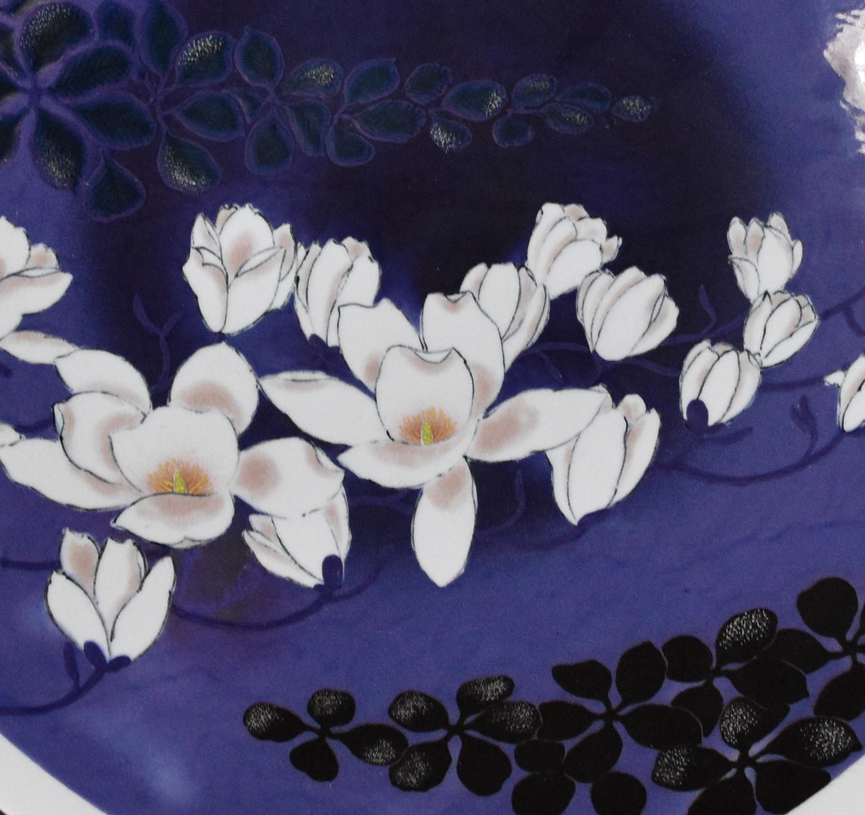 Extraordinary contemporary Japanese museum-quality decorative porcelain charger/centerpiece in a stunning soft octagonal shape, stunningly hand-painted in black and white on the artist's signature purple. It is the signed masterpiece by highly