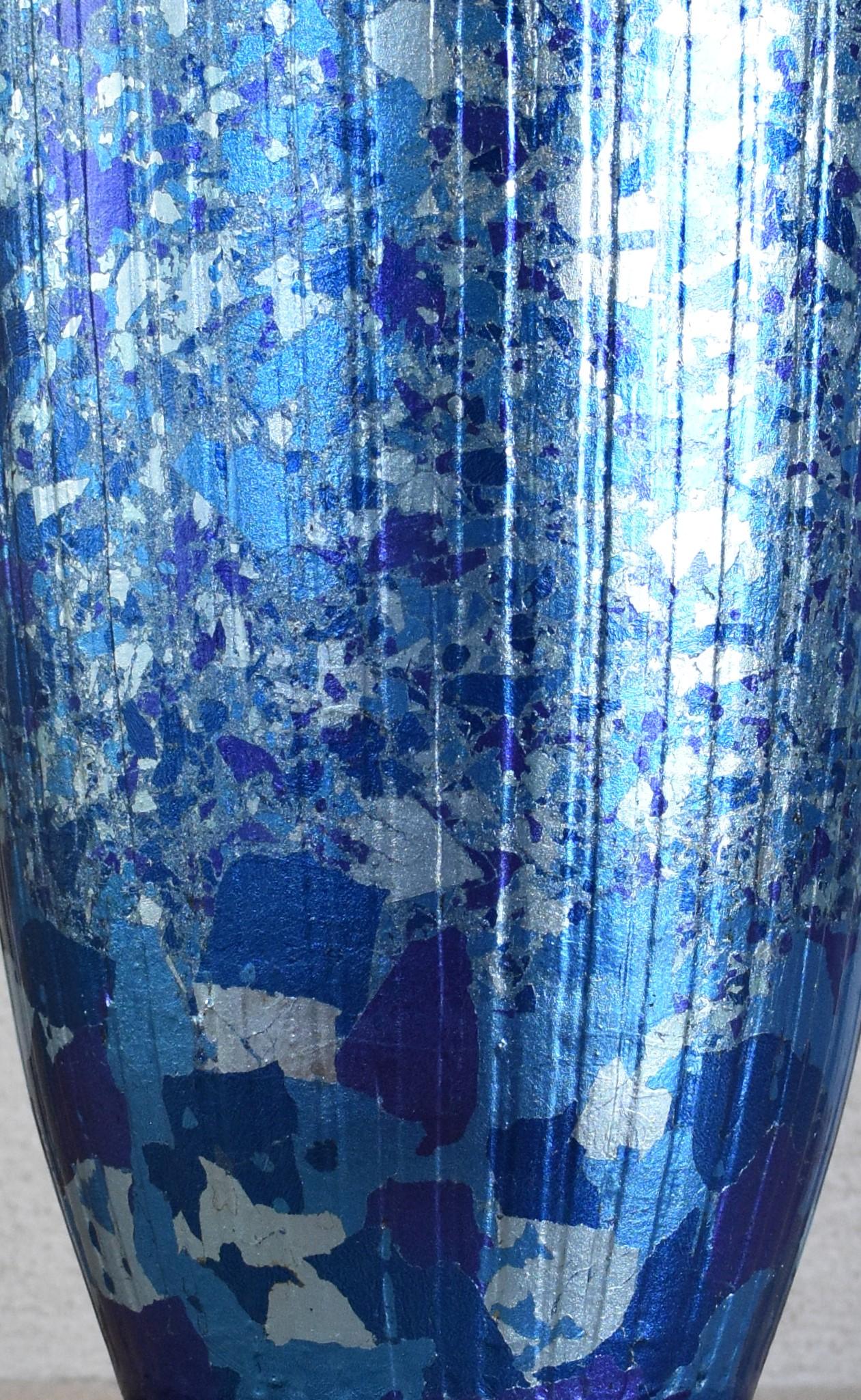 Extraordinary contemporary Japanese museum quality decorative porcelain vase with stunning etchings features silver foil in a beautiful combination of multiple hues of blue, meticulously positioned on the body of the vase, using lacquer as an