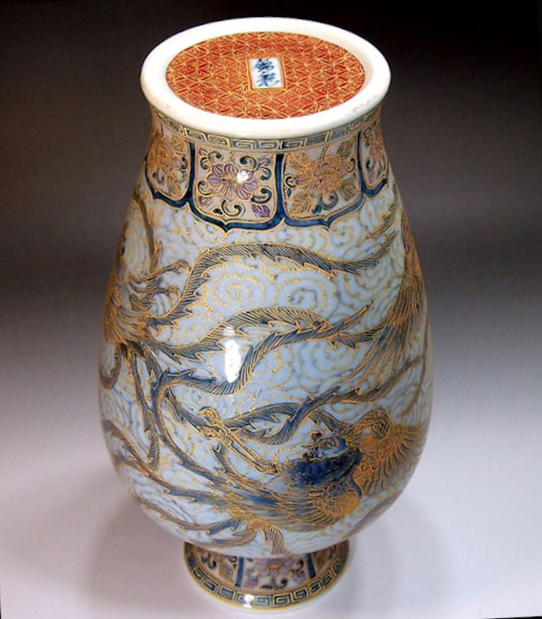 Exquisite contemporary Japanese hand painted decorative porcelain vase, an exclusive signature masterpiece in blue by highly acclaimed master porcelain artist of the Imari-Arita region of Japan and recipient of numerous awards for his exceptional