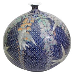 Scultura giapponese contemporanea in porcellana blu, grigio, pesca e oro del maestro Artistics