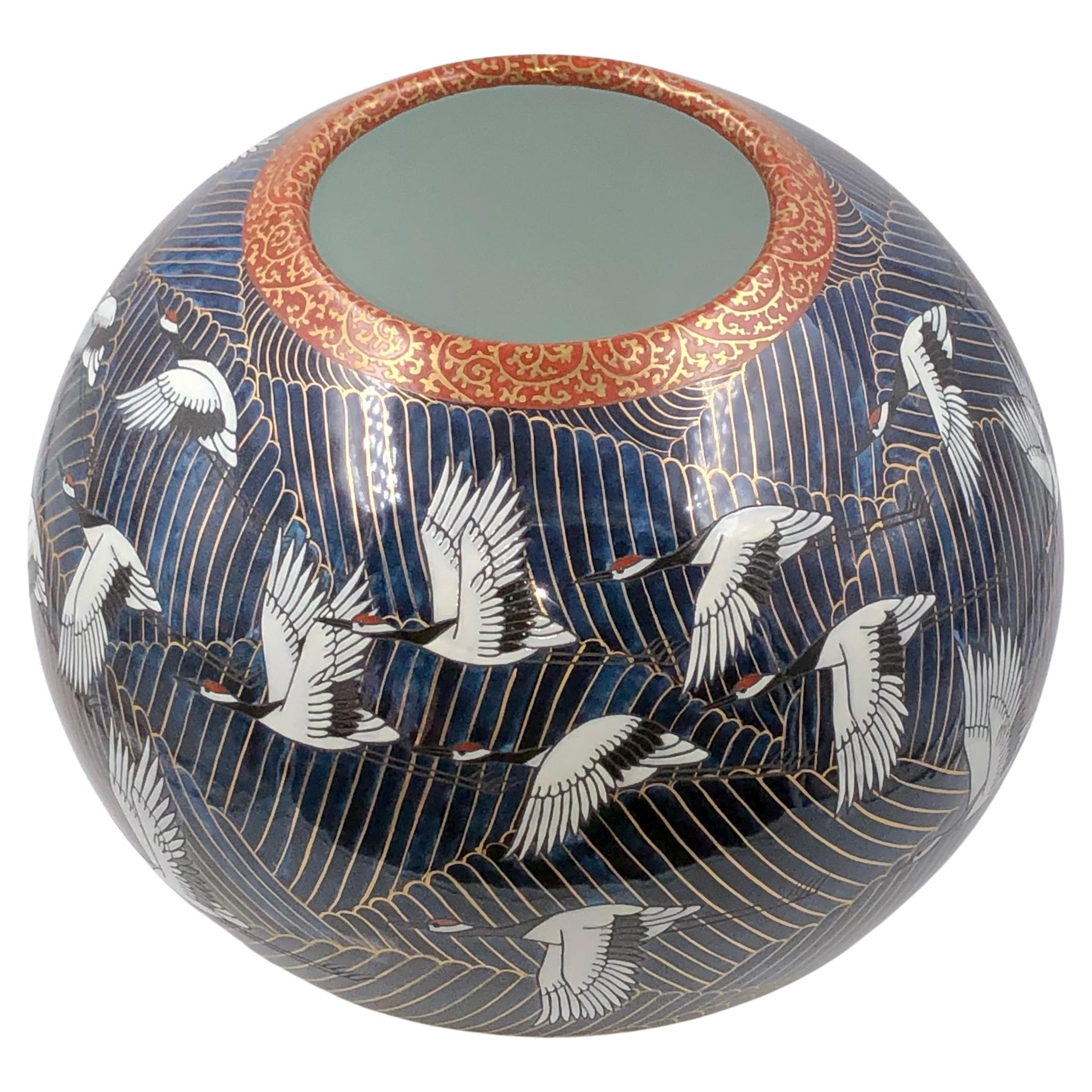 Extraordinary Japanese contemporary decorative porcelain vase, painstakingly intricately gilded and hand painted in a mesmerizing deep blue in various shades on a stunning globular body, a signed masterpiece by second-generation master porcelain