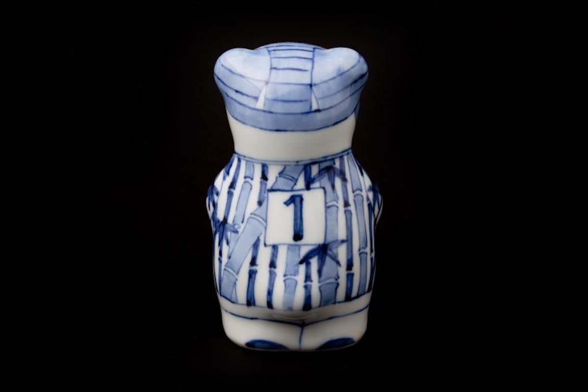 Exquisite Japanese contemporary porcelain Rugby bear, hand-painted in blue and white in an auspicious traditional Japanese bamboo pattern by Japanese artist from the historic Imari-Arita region of Japan.

This rugby bear is from the limited