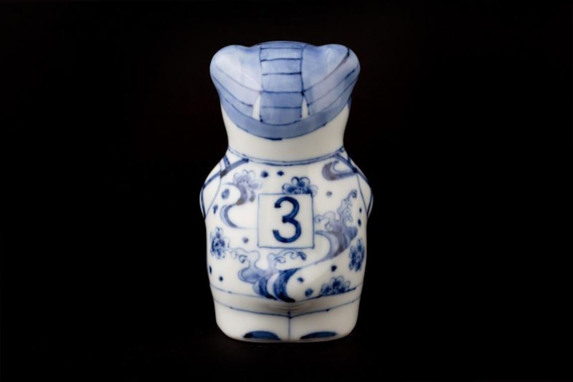 Japanese contemporary porcelain Rugby bear, hand-painted in blue and white in an auspicious traditional Japanese bamboo pattern by Japanese artist from the historic Imari-Arita region of Japan.

This rugby bear is from the limited edition series of
