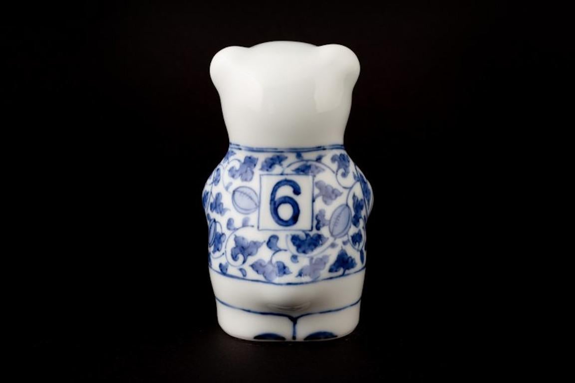 Stunning Japanese contemporary porcelain Rugby bear, hand-painted in blue and white in an auspicious traditional Japanese pattern by Japanese artist from the historic Imari-Arita region of Japan.

This rugby bear is from the limited edition series