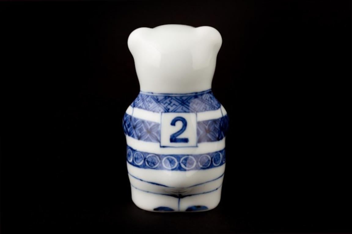 Exquisite Japanese contemporary sculpture of a rugby bear in fine porcelain, hand-painted by Japanee artist from the Imari-Arita region of Japan.

This rugby bear is from the limited edition series of seven rugby bears. The uniforms worn by the