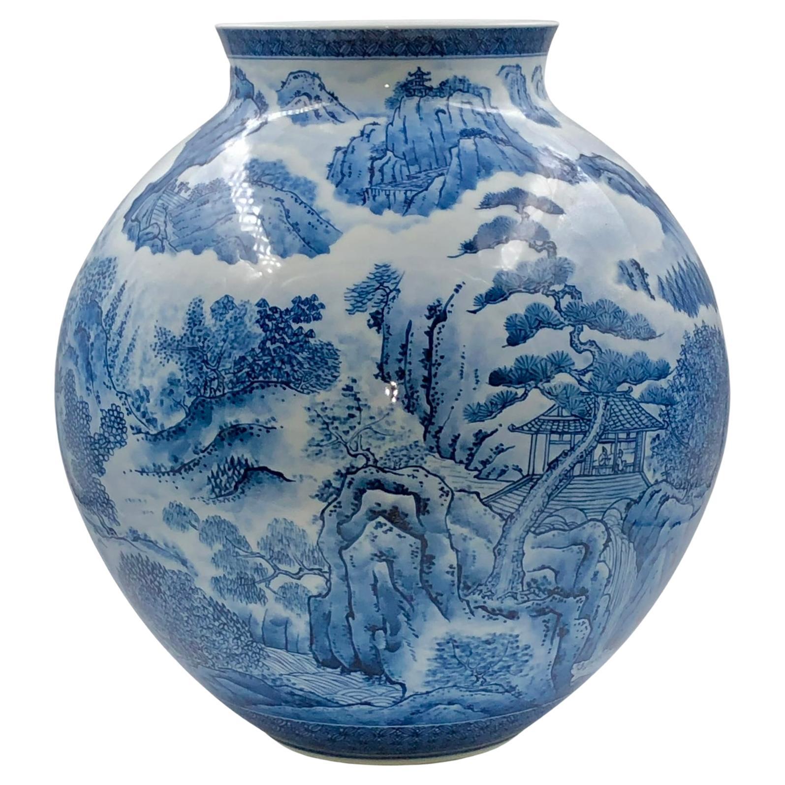 Extraordinary Japanese contemporary museum-quality decorative porcelain vase, painstakingly intricately hand painted in blue underglaze on an elegantly shaped ovoid porcelain body, a signed masterpiece by highly acclaimed award-winning