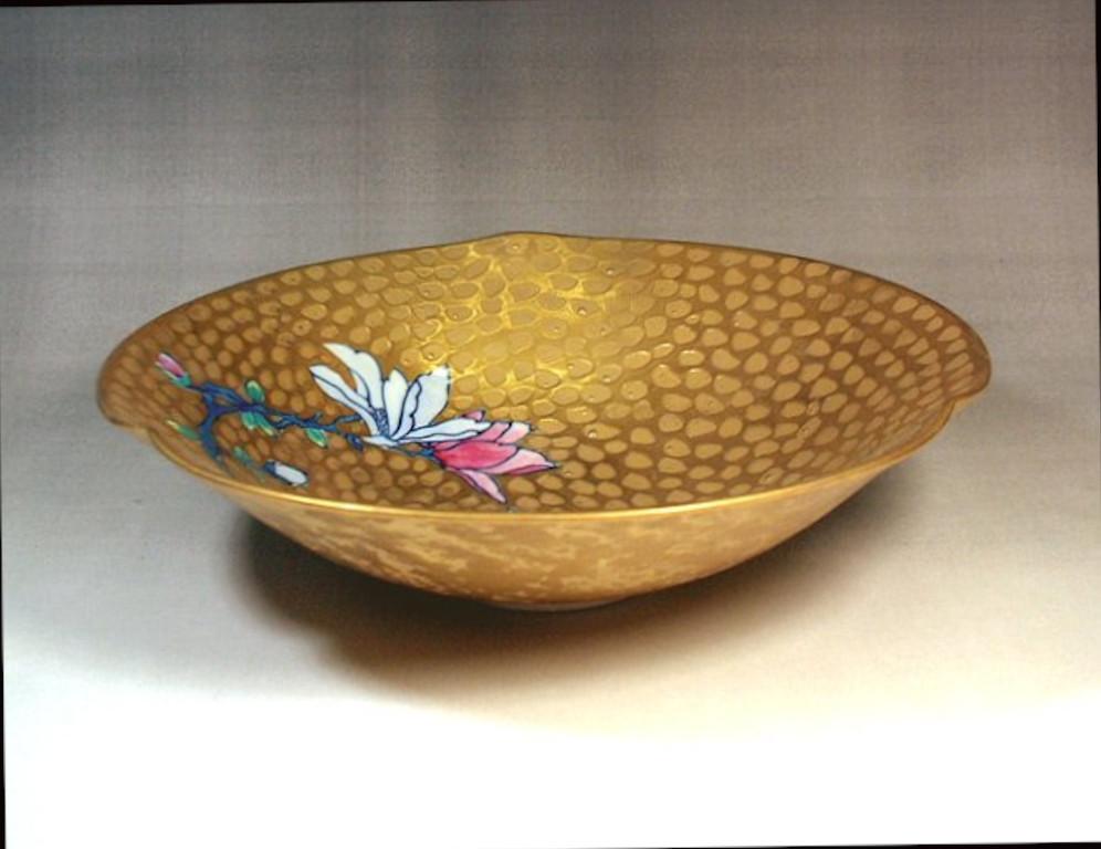 Unique contemporary Japanese dimpled decorative porcelain plate, an elegant piece gilded and hand painted by highly acclaimed porcelain artist of Japan’s Imari-Arita region. This master artist is the recipient of numerous awards for his exceptional