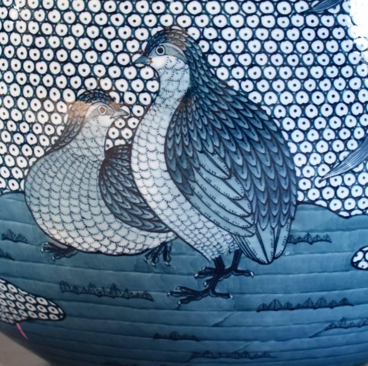 Extraordinary contemporary decorative porcelain vase in blue underglaze on a beautifully shaped body, extremely intricately hand-painted, a stunning masterpiece by highly acclaimed award-winning master porcelain artist of the Imari-Arita region of