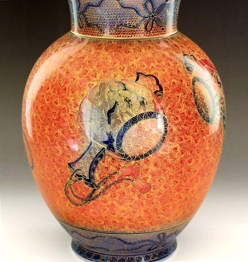 This extraordinary contemporary Japanese Ceramic vase is an exclusive signature piece by highly acclaimed master porcelain artist of the Imari-Arita region of southern Japan and recipient of numerous awards for his exceptional application of gold