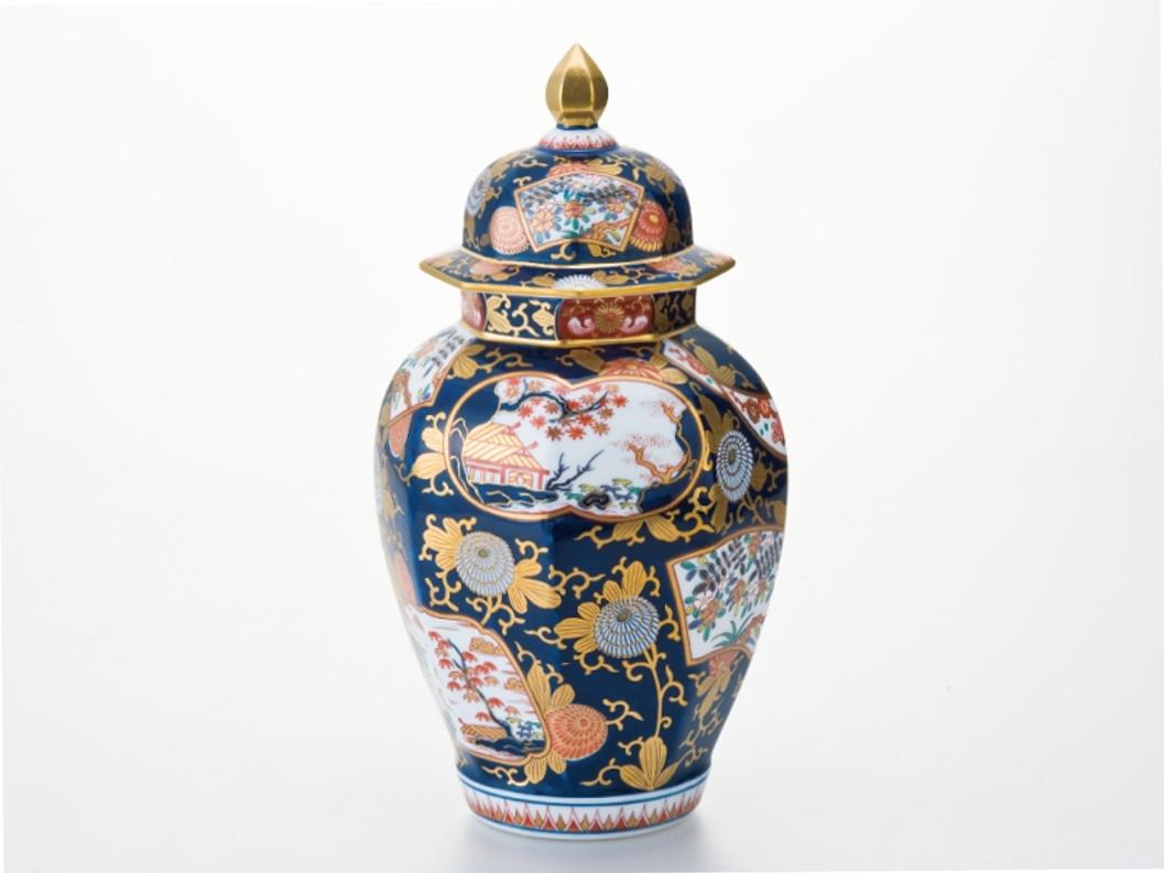 elegent contemporary Japanese Ko-Imari style porcelain decorative vase, with a beautifully shaped rectangular body in cobalt blue, red and green with generous application of gold on a pure white porcelain, characteristic of Ko-Imari style. this