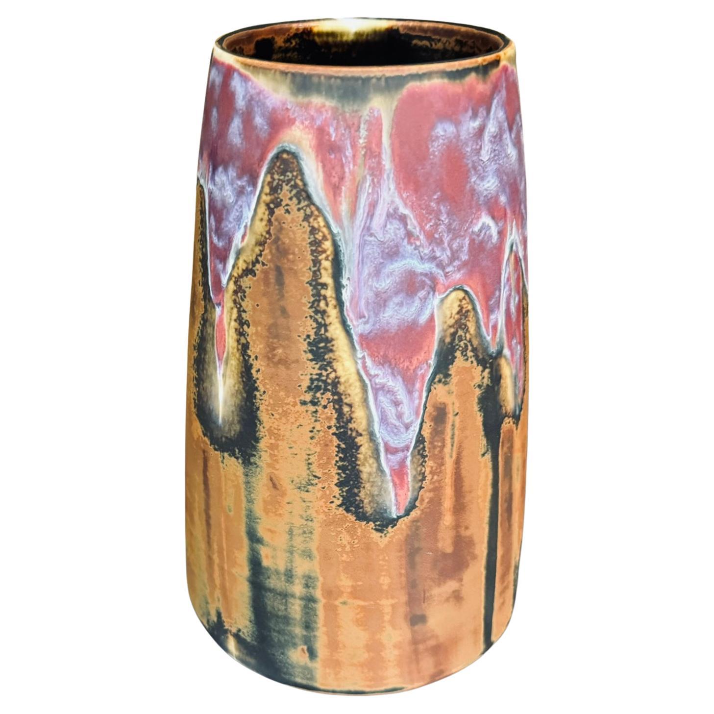 Exquisite Japanese contemporary matte hand-glazed signed decorative porcelain vase in an elegant shape, featuring signature pink, brown and blue colors by highly respected award-winning second generation master artist from the historic Arita-Imari