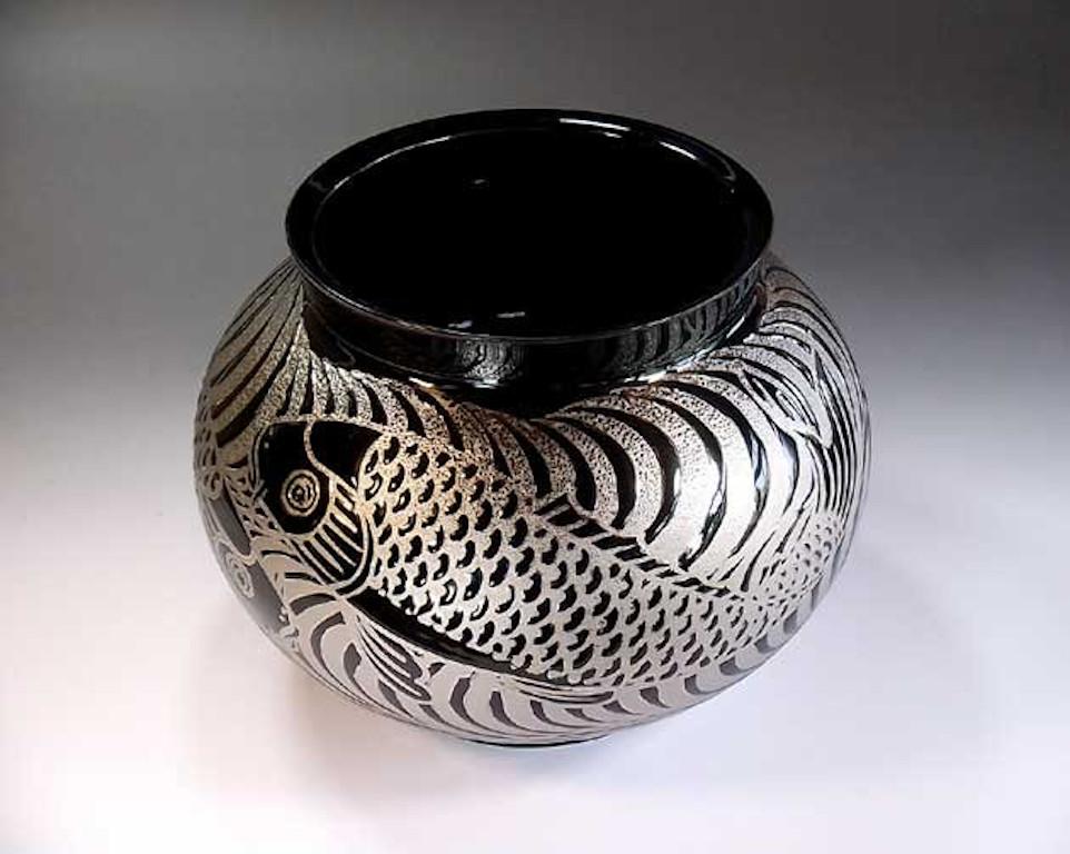 Japanese contemporary decorative porcelain vase, dramatically hand painted in platinum, set against a stunningly shaped porcelain body in black, a signed masterpiece belonging to the artist's signature fish collection by highly acclaimed master