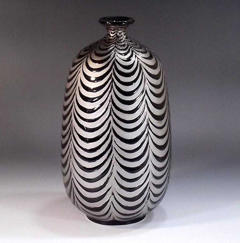 Contemporary Japanese decorative porcelain vase hand painted in platinum against a black background over a beautifully shaped body, an exclusive signature piece by a highly acclaimed award-winning Japanese master porcelain artist. In 2016, the