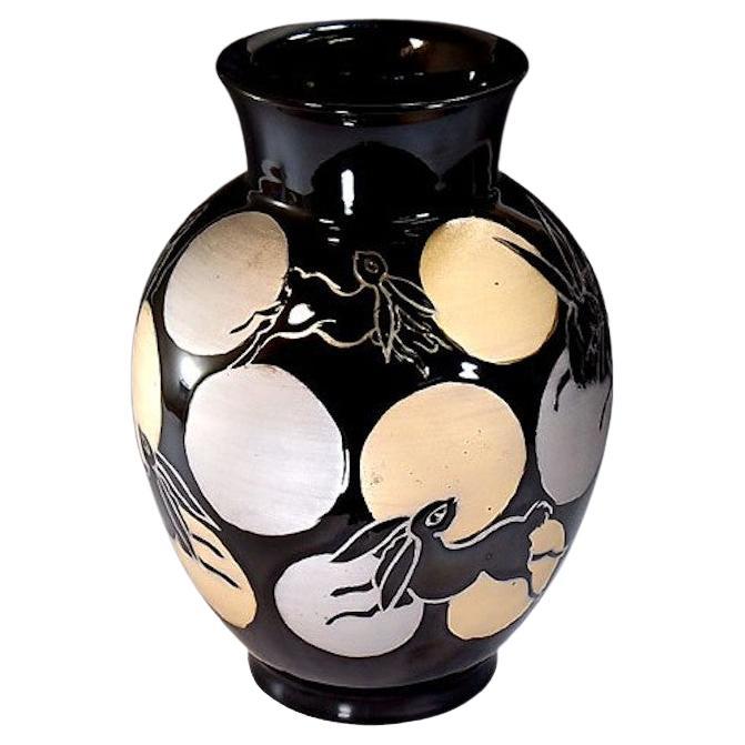 Japanese contemporary decorative porcelain vase, hand-painted in platinum and gold on a beautifully shaped body, set against a black background, a signed piece by highly acclaimed Japanese master porcelain artist in the Imari-Arita tradition and the