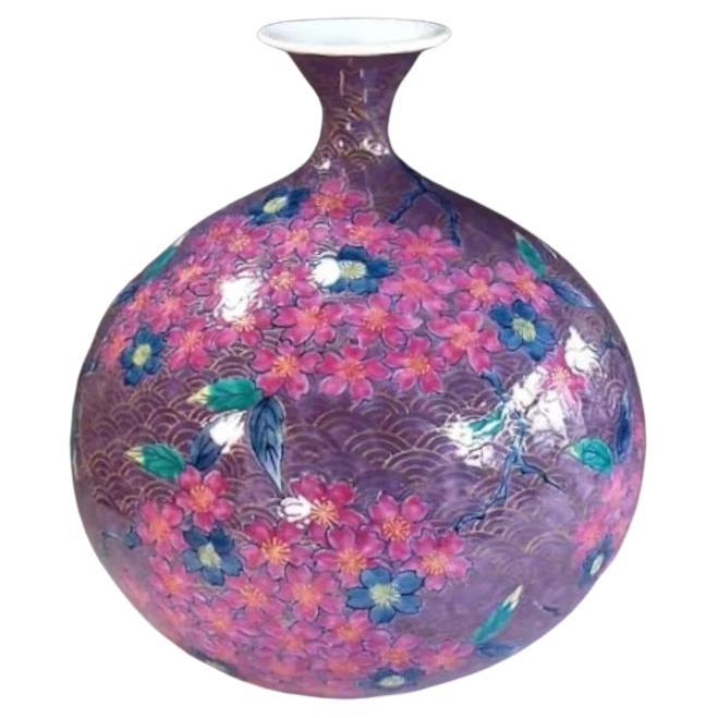 Exquisite Japanese contemporary gilded porcelain vase in an elegant shape, intricately hand-painted in various hues of purple and pink, a masterpiece by highly acclaimed master porcelain artist of the Imari-Arita region of southern Japan. In 2016,