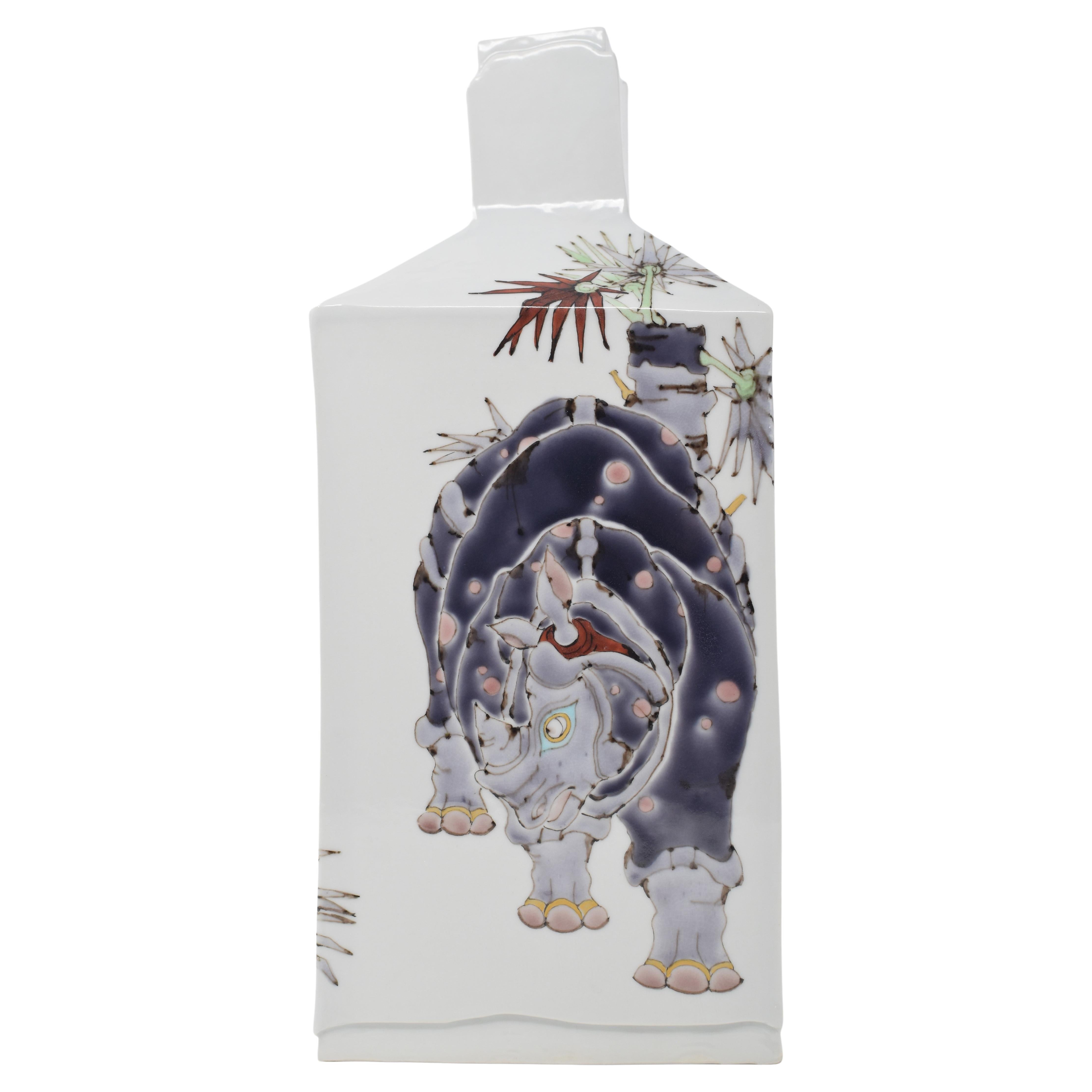 Extraordinary Japanese contemporary mueum quality decorative porcelain vase, stunningly hand painted in purple and red on a beautifully shaped rectangular body with a unique interpretation of the rhinoceros, a masterpiece by widely respected master