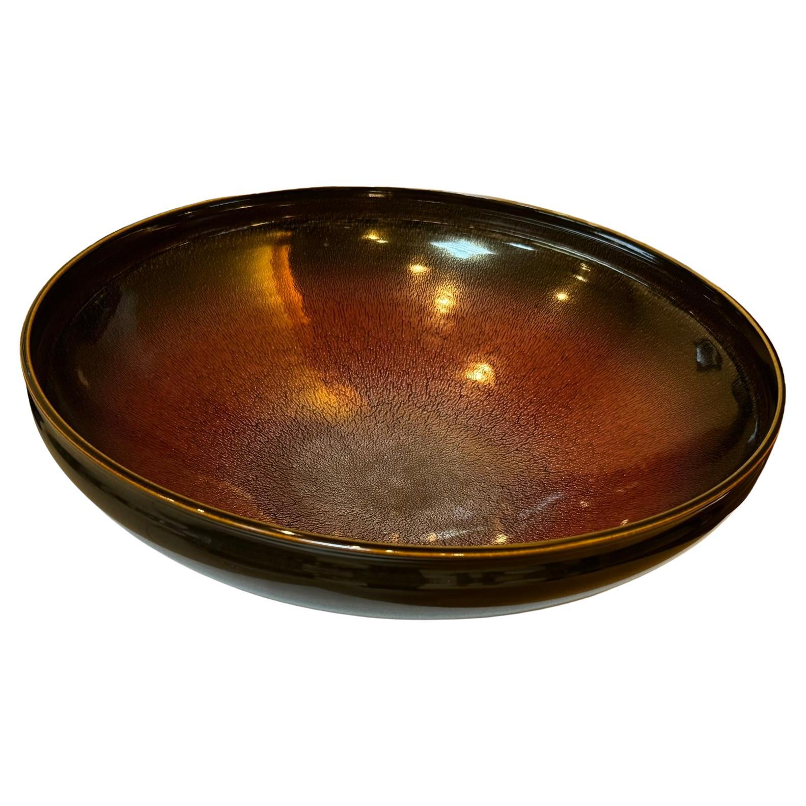 Mesmerizing Japanese contemporary signed exhibition porcelain bowl/centerpiece in stunning red, cream and black, a signed masterpiece by highly acclaimed award-winning Japanese master porcelain artist, in the artist's beloved signature shape and