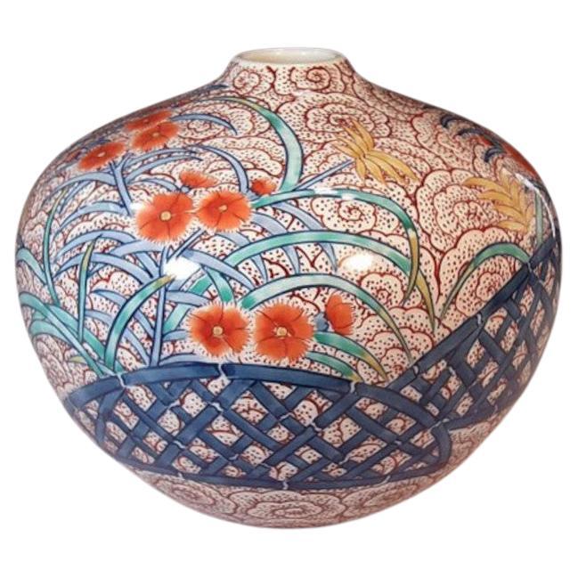 Vaso giapponese contemporaneo in porcellana rossa, blu e verde del maestro Artistics, 2