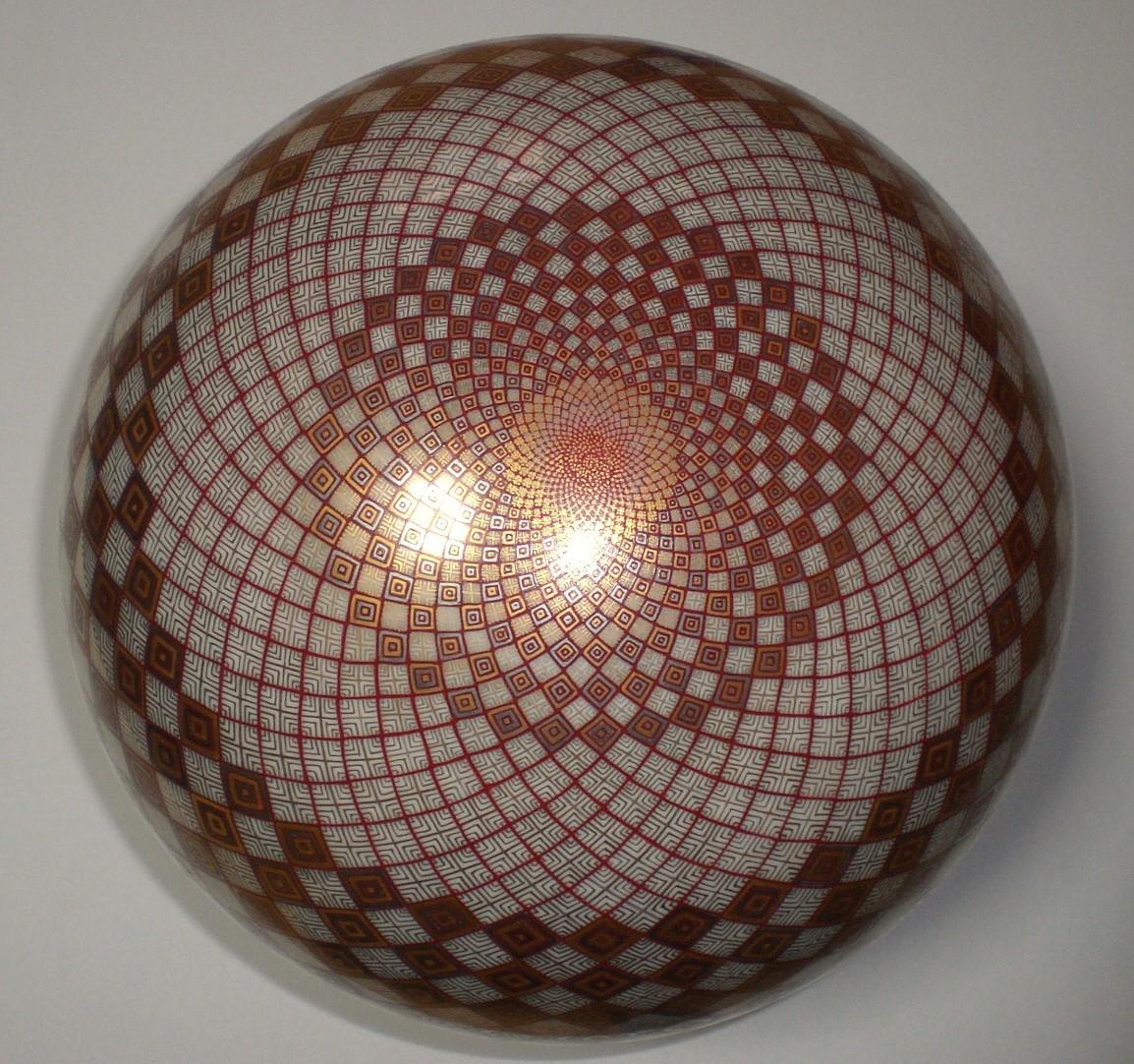 Extraordinary Japanese contemporary decorative porcelain box, extremely intricately platinum and gold gilded and hand painted on an exquisite ovoid shape body, featuring an extremely intricate geometric progression expressed in red, cream, gold and