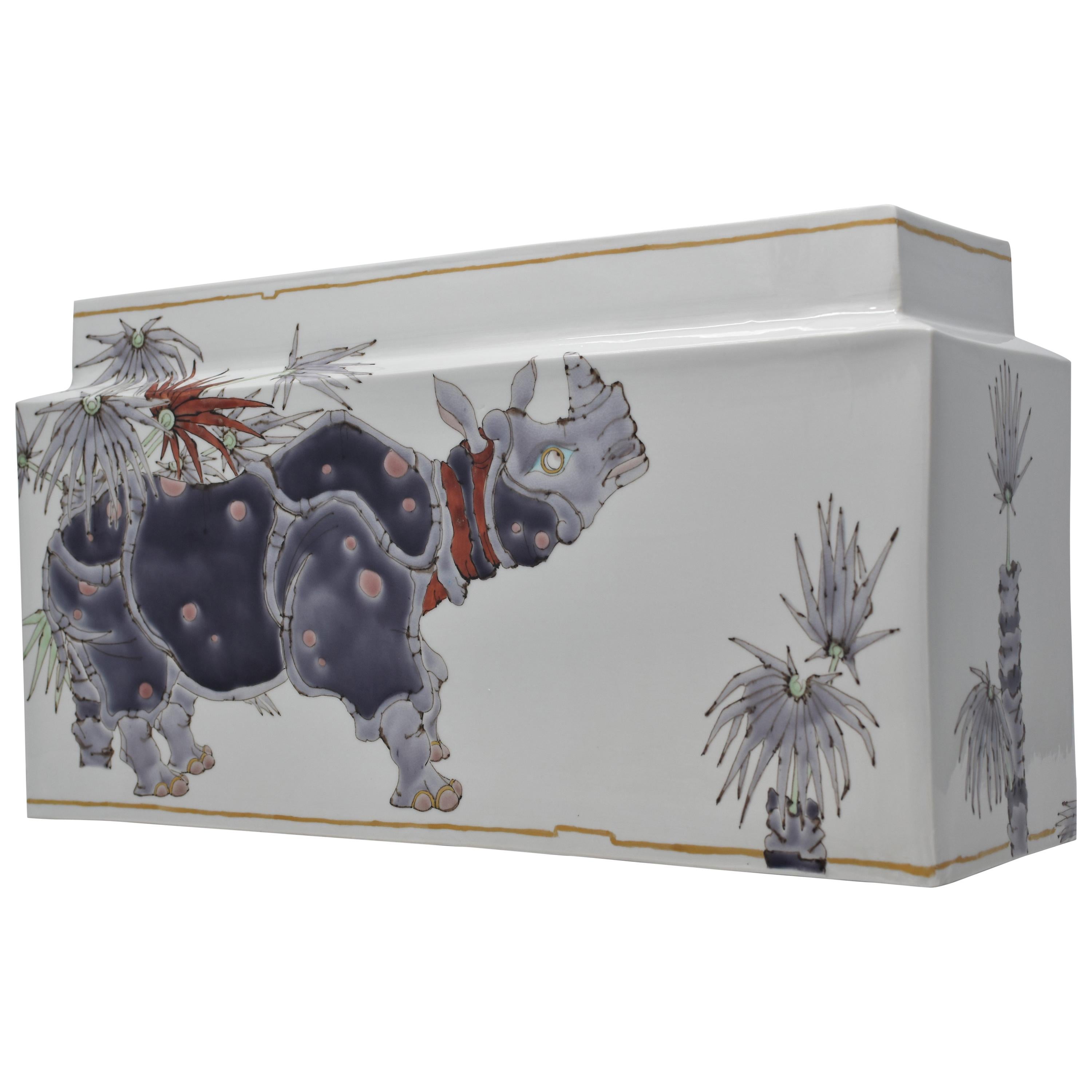 Extraordinary museum quality Japanese contemporary signed decorative porcelain vase, stunningly hand painted on an elegant rectangular body in vivid hues of purple, red and gray, with a unique interpretation of rhinoceros. The highly acclaimed