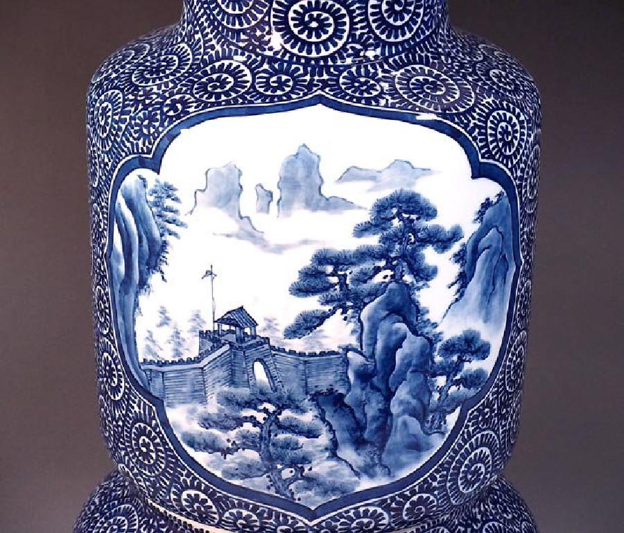 Exceptional Japanese contemporary large three-piece decorative porcelain lidded vase/jar, intricately hand-painted in cobalt blue underglaze on an elegantly shaped body with two beautiful handles, a signed masterpiece by highly acclaimed master