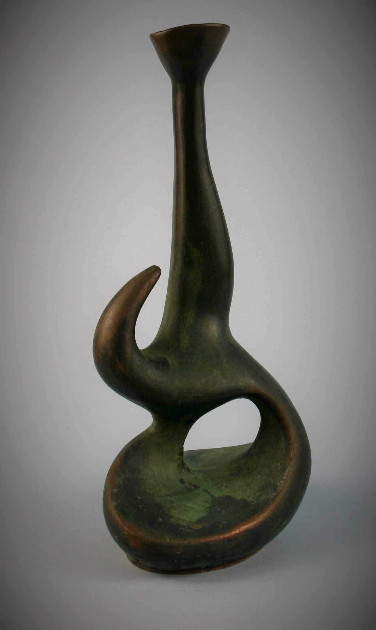 3-613 Japanese copper clad ceramic bud vase/sculpture
Ceramic vase clad in molted copper.