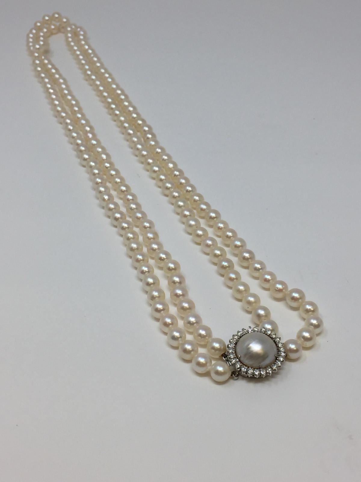 Round Cut Japanese Cultured Double Strand Pearl with 14 Karat Diamond and Moby Pearl Clasp For Sale