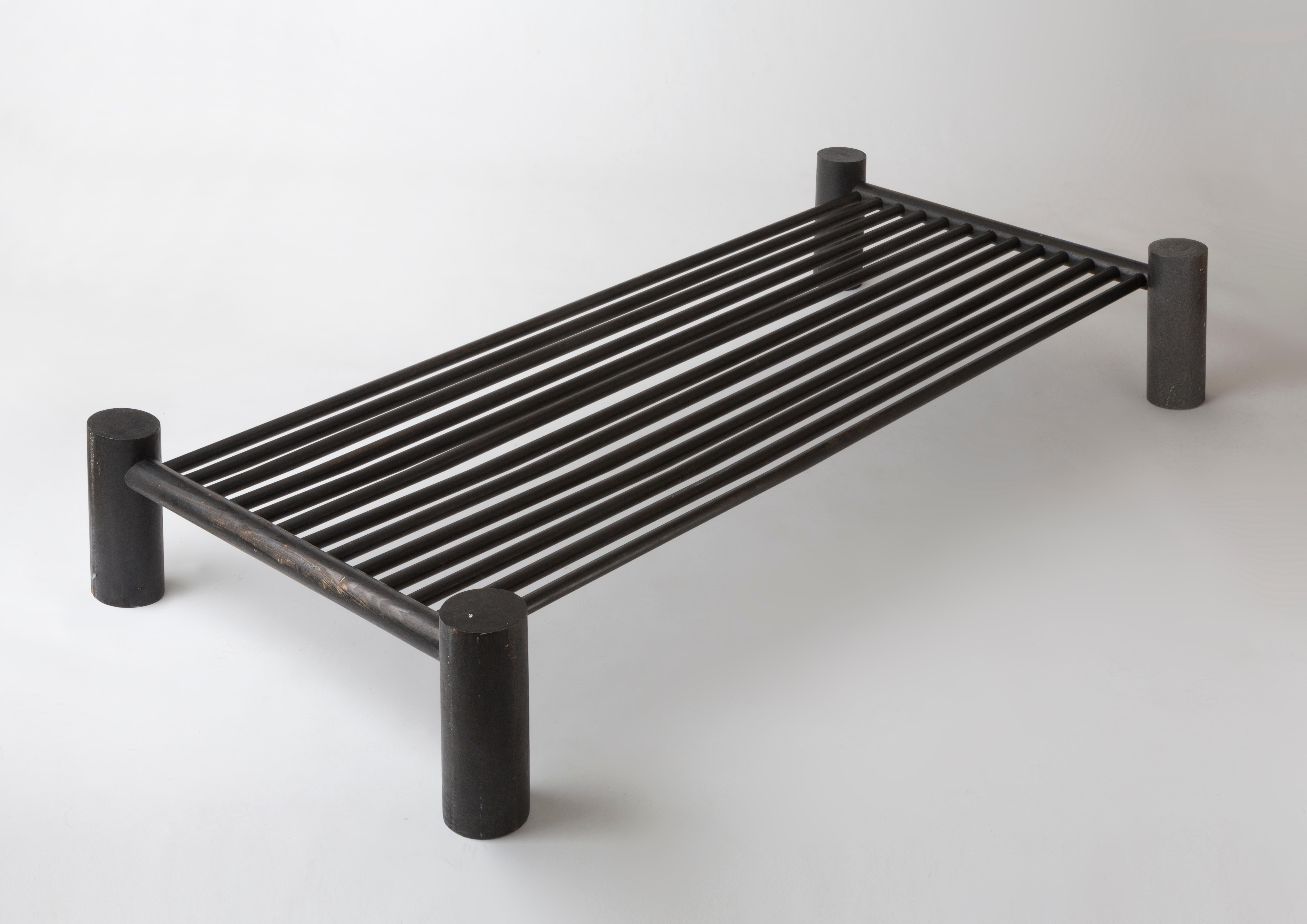 A Japanese daybed in ebonized wood, circa 1960.
