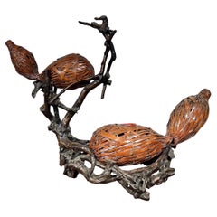 Cesta tejida japonesa de doble calabaza Ikebana y raíz