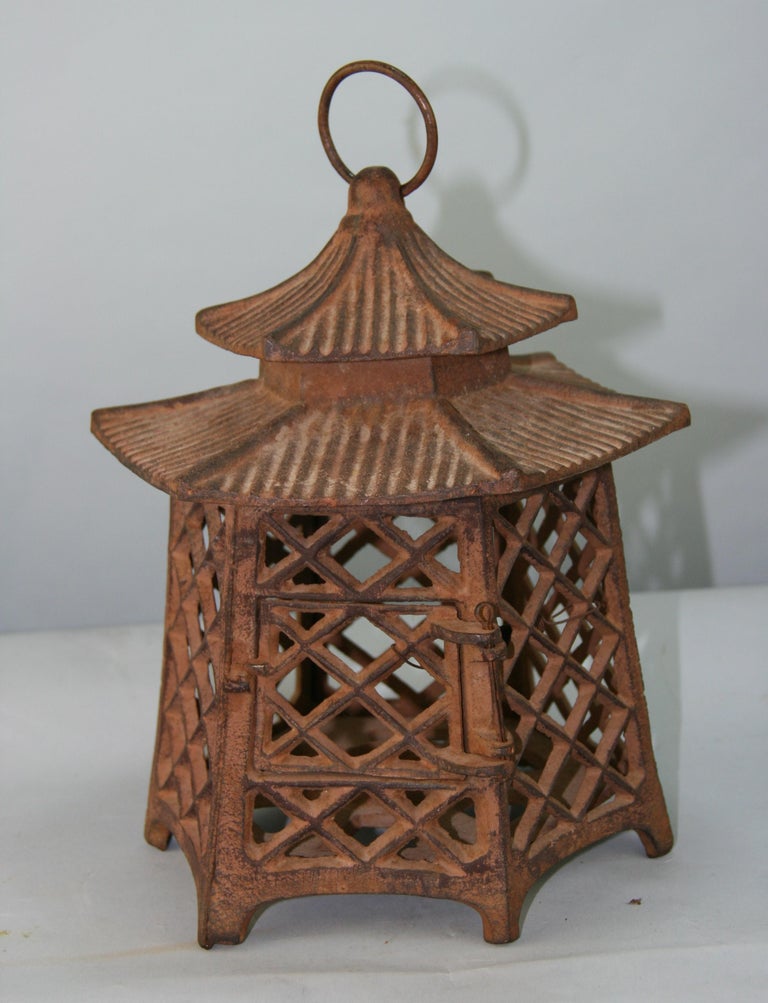 Japanese double pagoda tilted iron garden lantern.