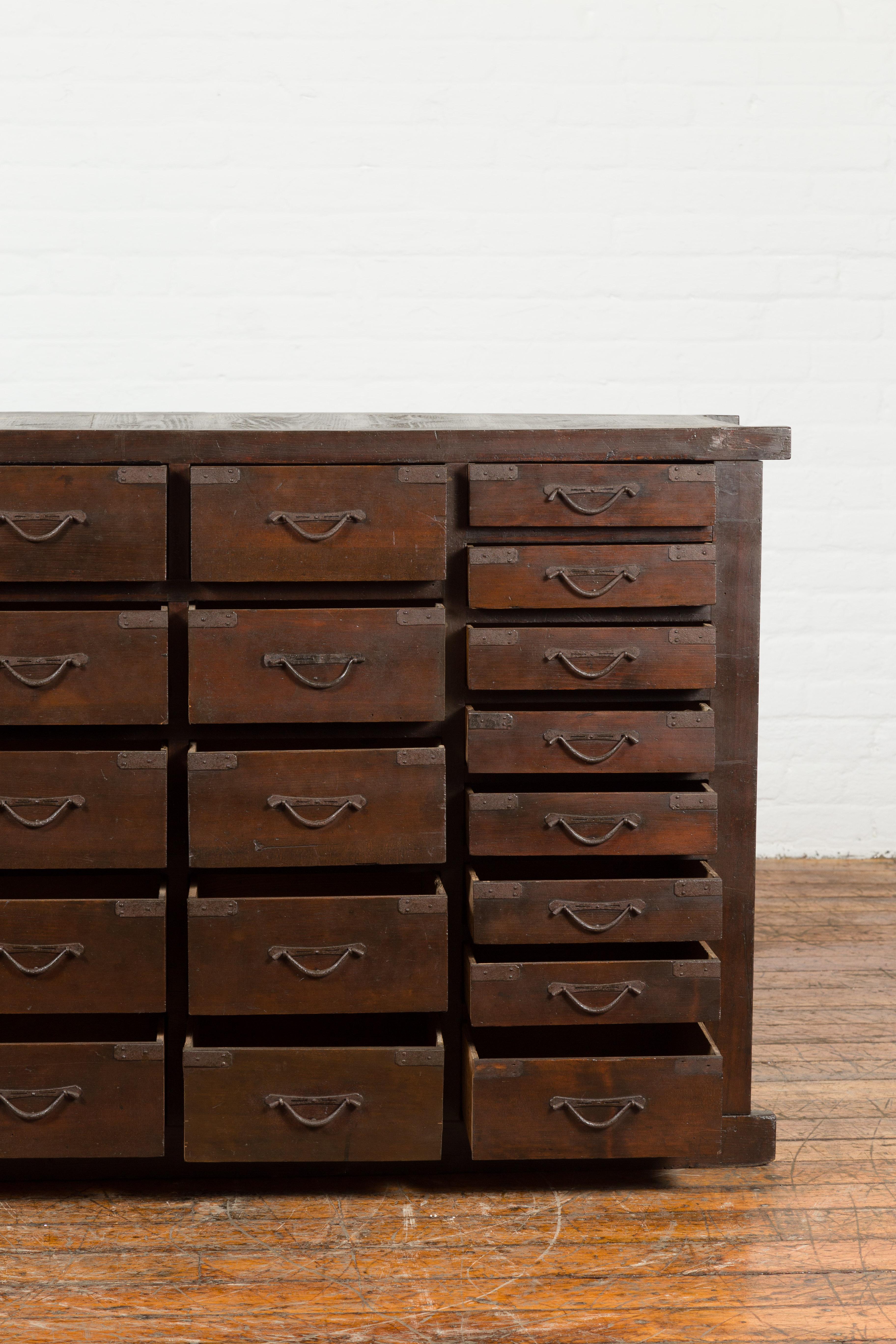 Japanese Early 20th Century Apothecary Chest with 28 Drawers and Brown Patina 6