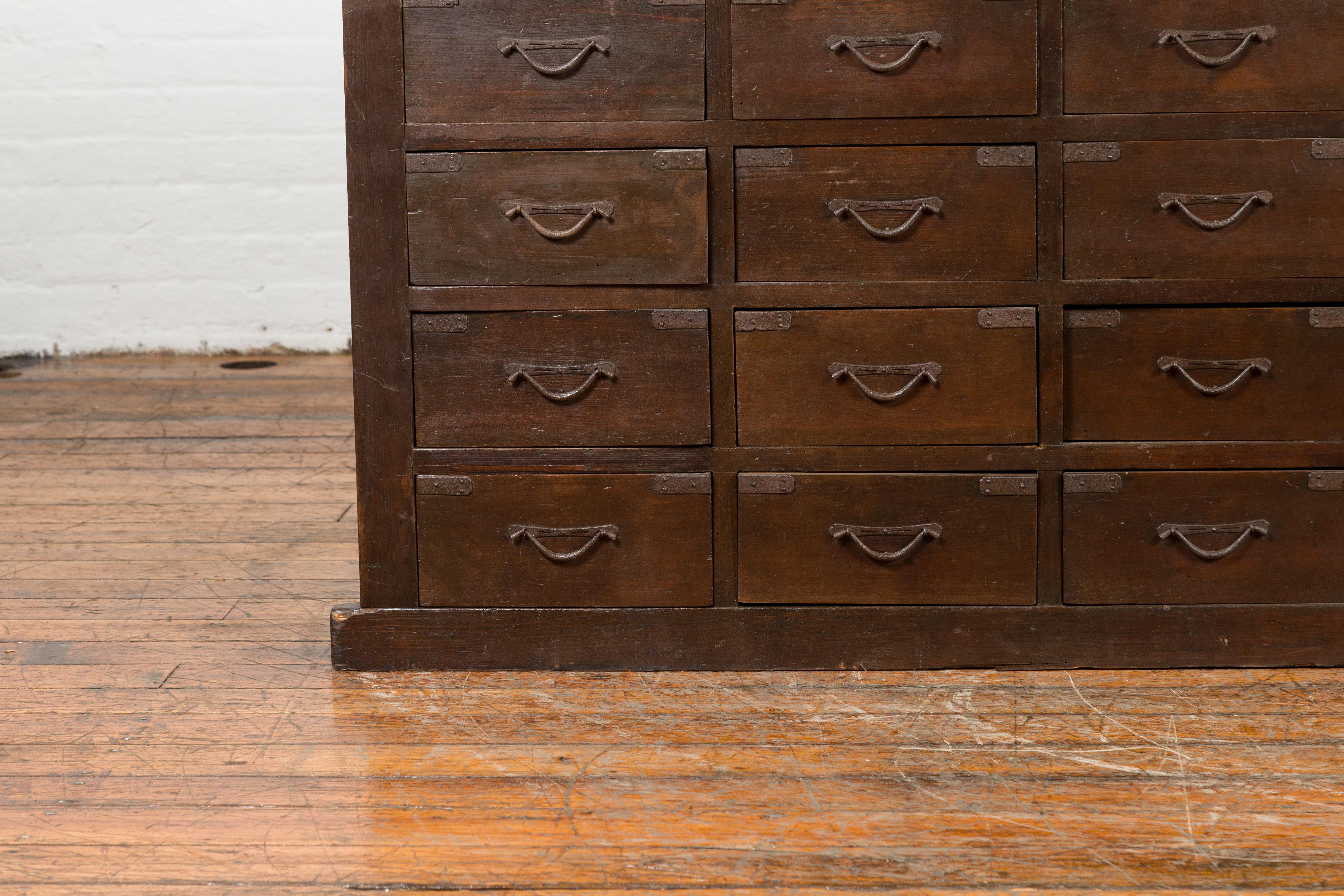 Japanese Early 20th Century Apothecary Chest with 28 Drawers and Brown Patina 1