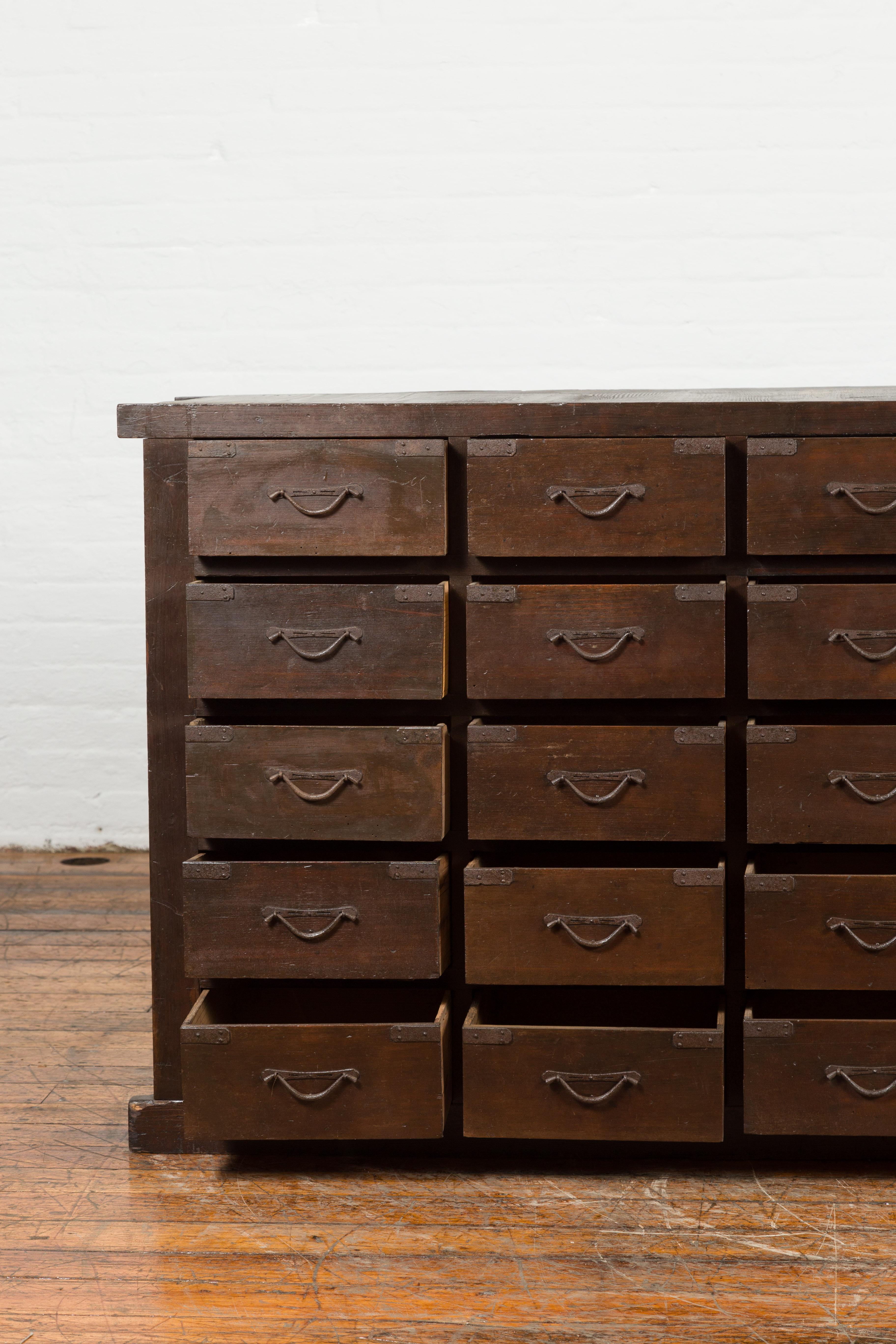 Japanese Early 20th Century Apothecary Chest with 28 Drawers and Brown Patina 4