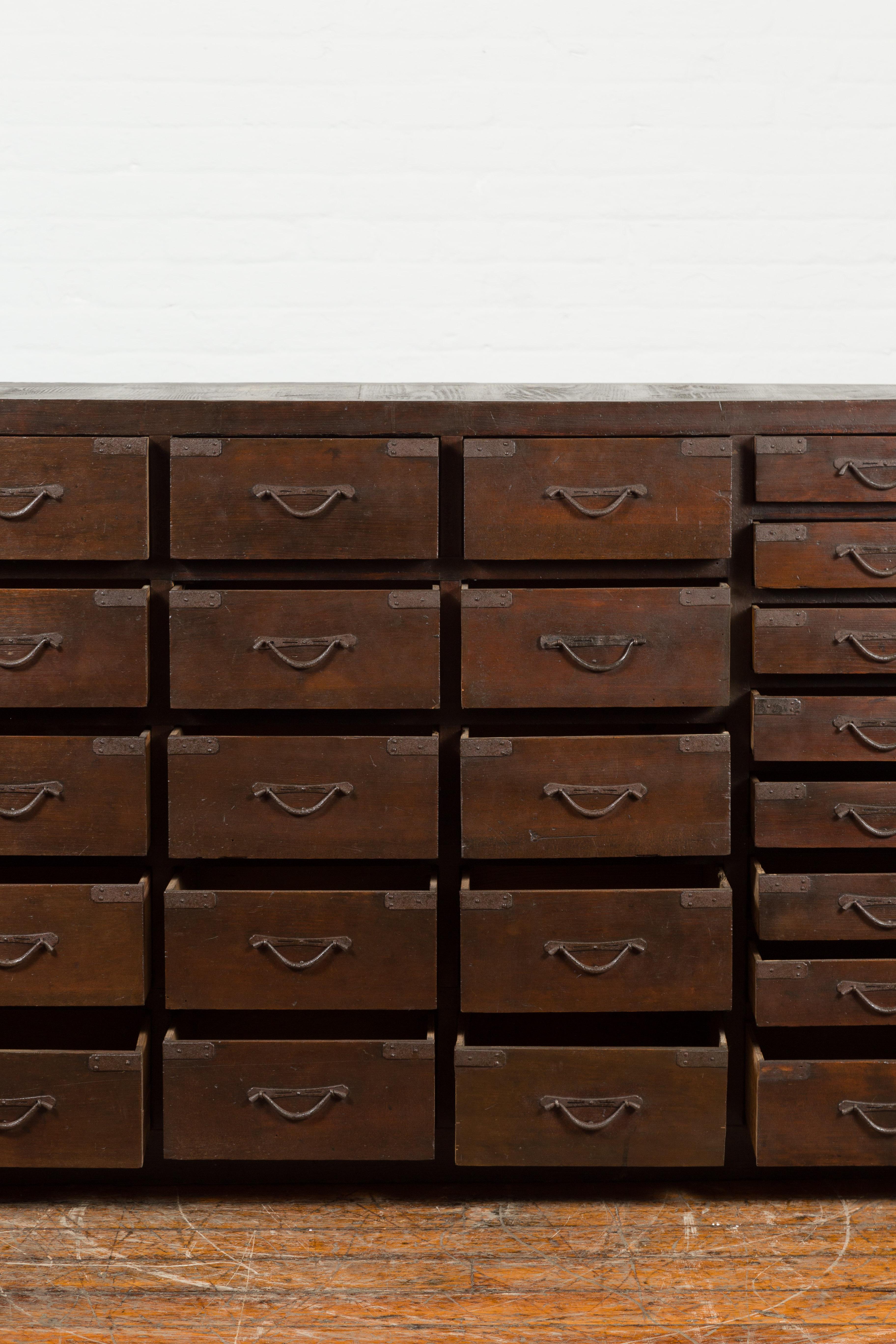 Japanese Early 20th Century Apothecary Chest with 28 Drawers and Brown Patina 5