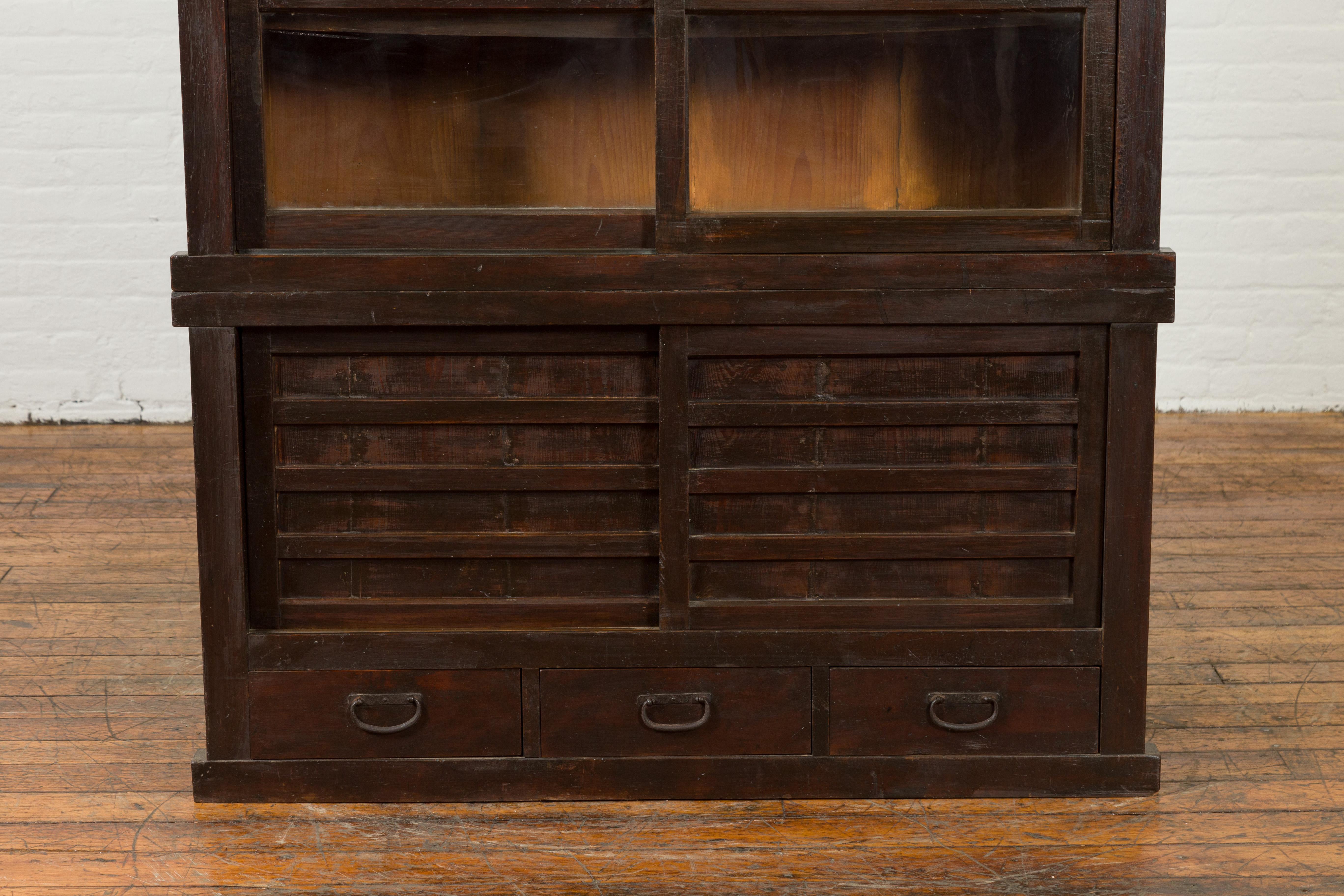 Japanese Early 20th Century Wooden Bookcase with Glass Sliding Doors and Drawers In Good Condition In Yonkers, NY