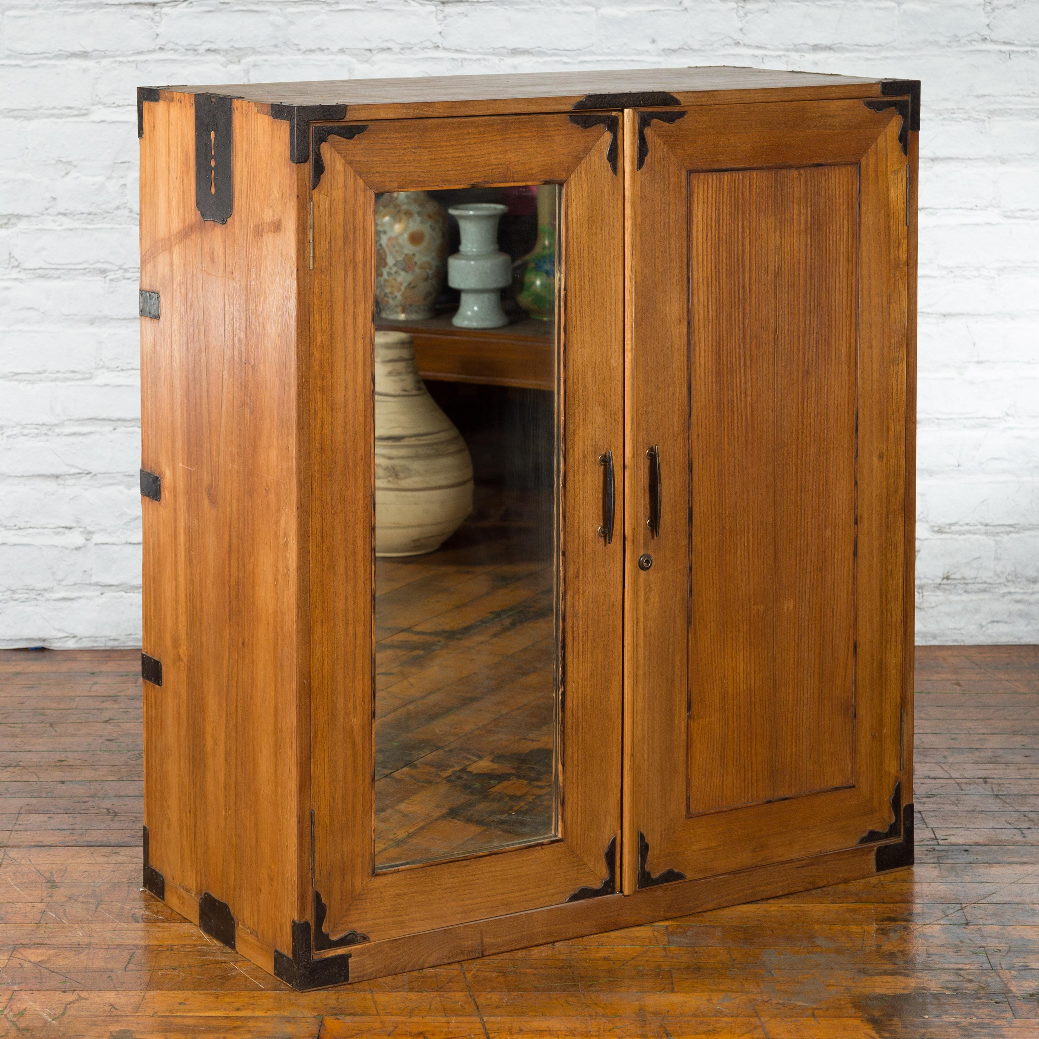 Japanese Early 20th Century Wooden Tansu Clothing Cabinet with Mirrored Door In Good Condition For Sale In Yonkers, NY