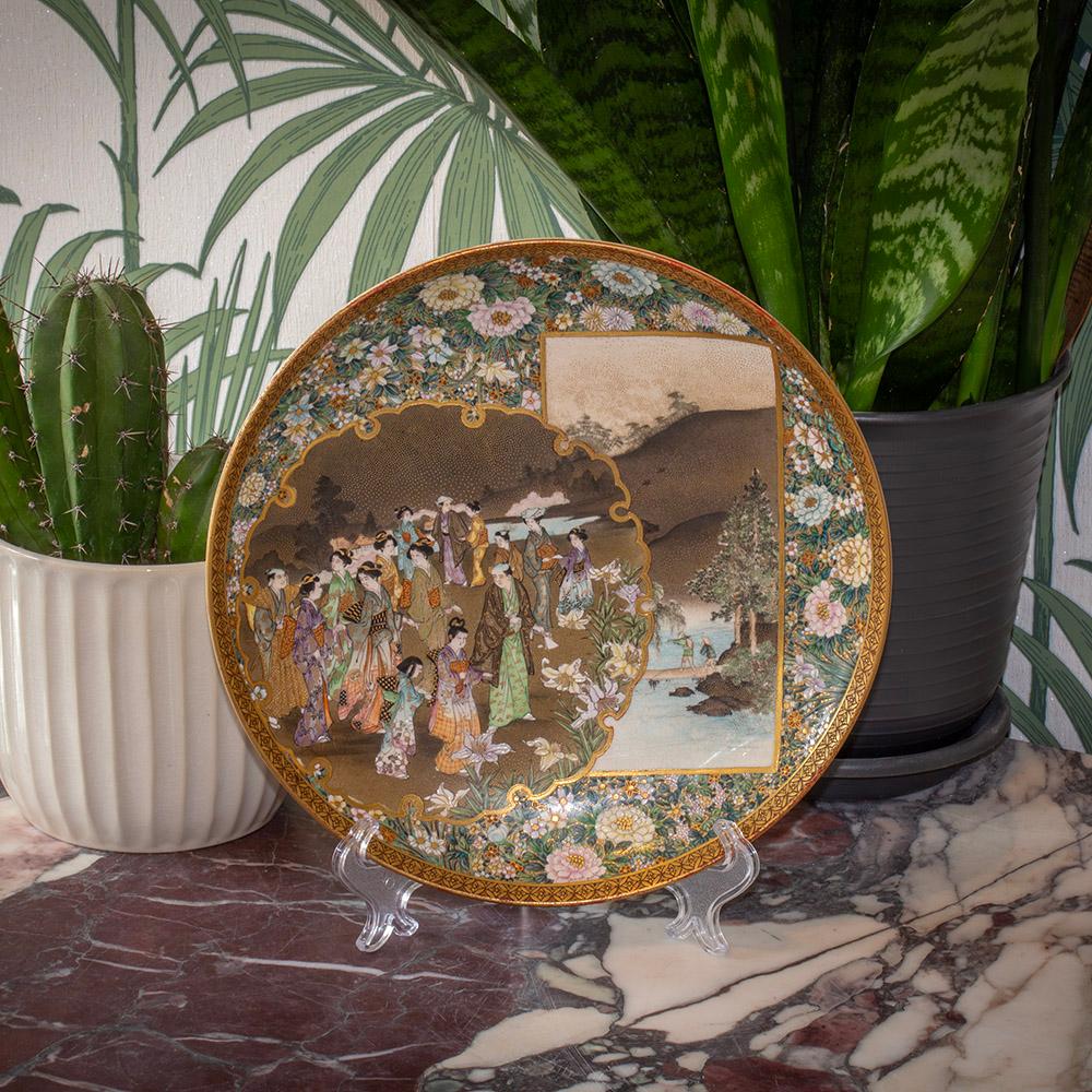 Millefleur with Figures

From our Japanese collection, we are delighted to offer this Japanese Meiji Period Satsuma Plate by Kinkozan. The Satsuma Plate is extensively decorated with a two central scenes. The left hand scene is outlined with an