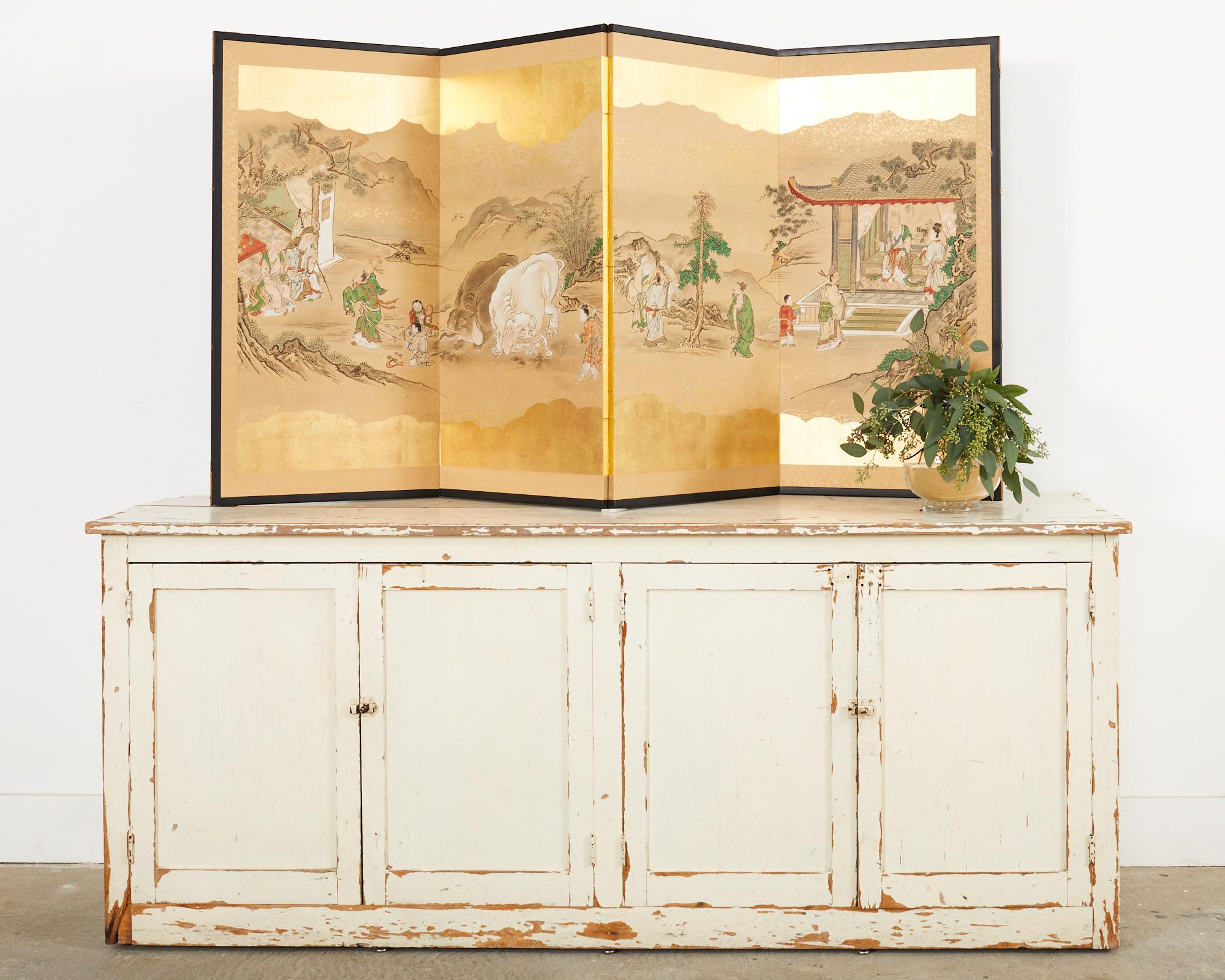 Early 19th century late Edo period Japanese four-panel screen depicting examples from the 24 paragons of filial piety. Painted in the Kano School style featuring figures in colorful, ornate robes and mythical elephant beasts. Ink and natural color