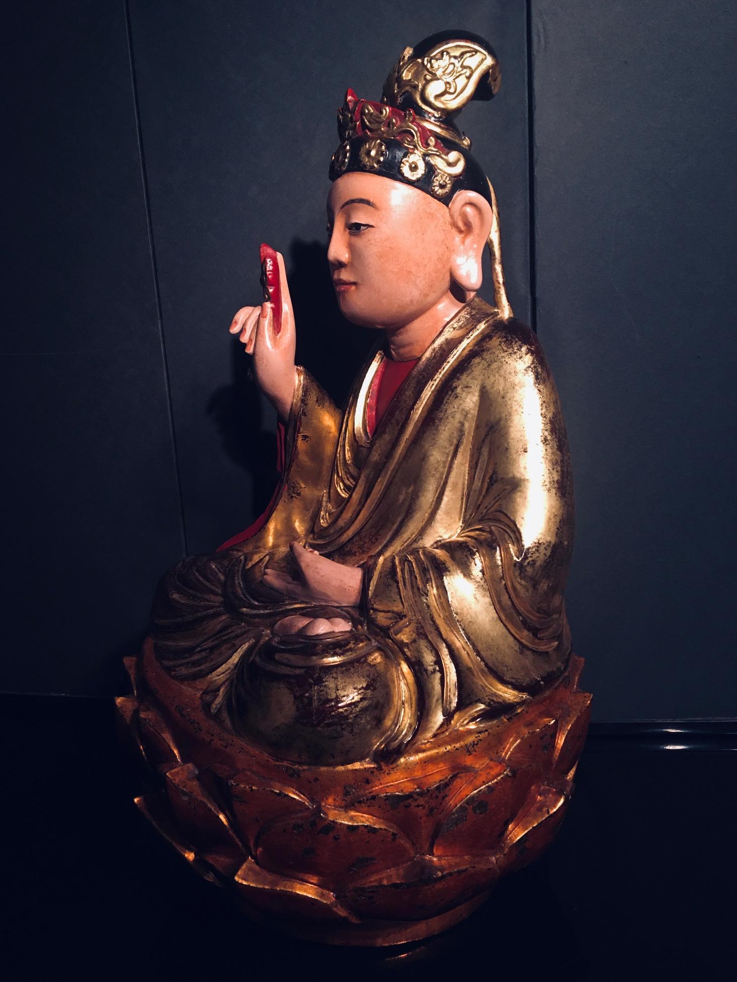 Lacquer 19th Century Vietnamese Carved and Gilt Seated Bodhisattva Holding a Flower For Sale