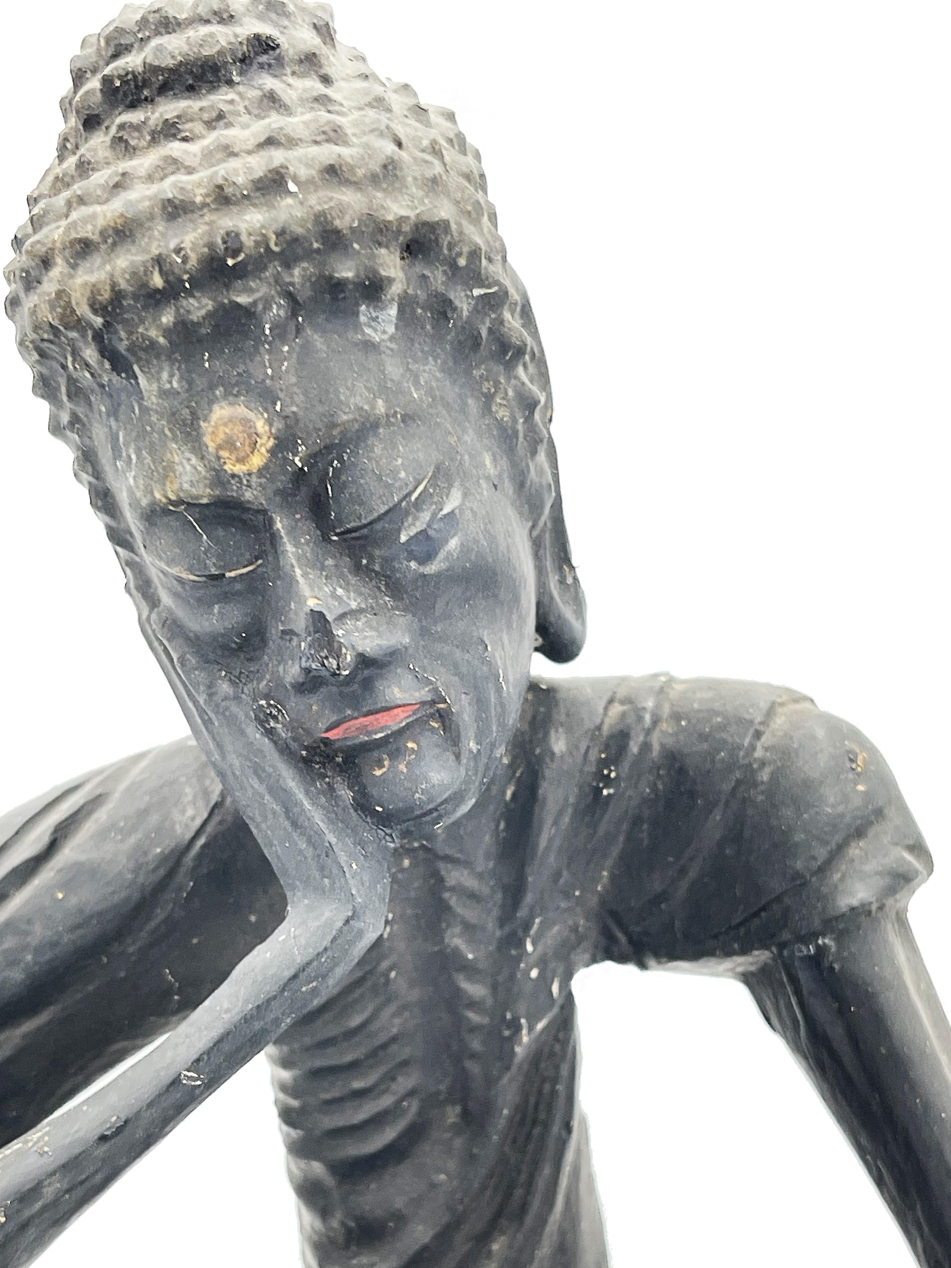 Buddha seduto del digiuno intagliato del periodo Edo giapponese, 18° C./inizio 19° C.

DIMENSIONI
Altezza: 9,5 pollici (24 cm)
Larghezza: 7 pollici (18 cm)
Profondità: 5 pollici (12,8 cm)

CIRCA
Questo pezzo del primo periodo Edo (1603-1868),