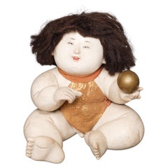 Antique Japanese Edo-period gosho’ningyô 御所人形 (palace doll) of plump, seated child