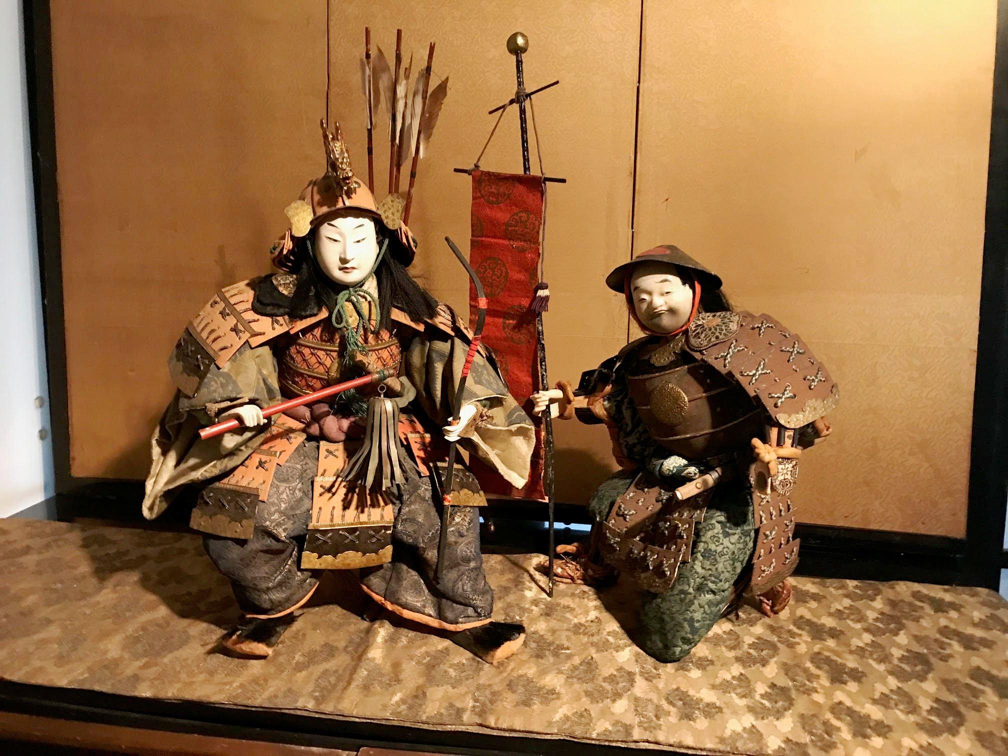 Japanese Edo period Musha Ningyo (boys' day doll) of a samurai and attendant. Pairs of ningyo of this very fine quality almost never appear for sale, much less with all the accessories, as we have here. They have finely carved faces, and are