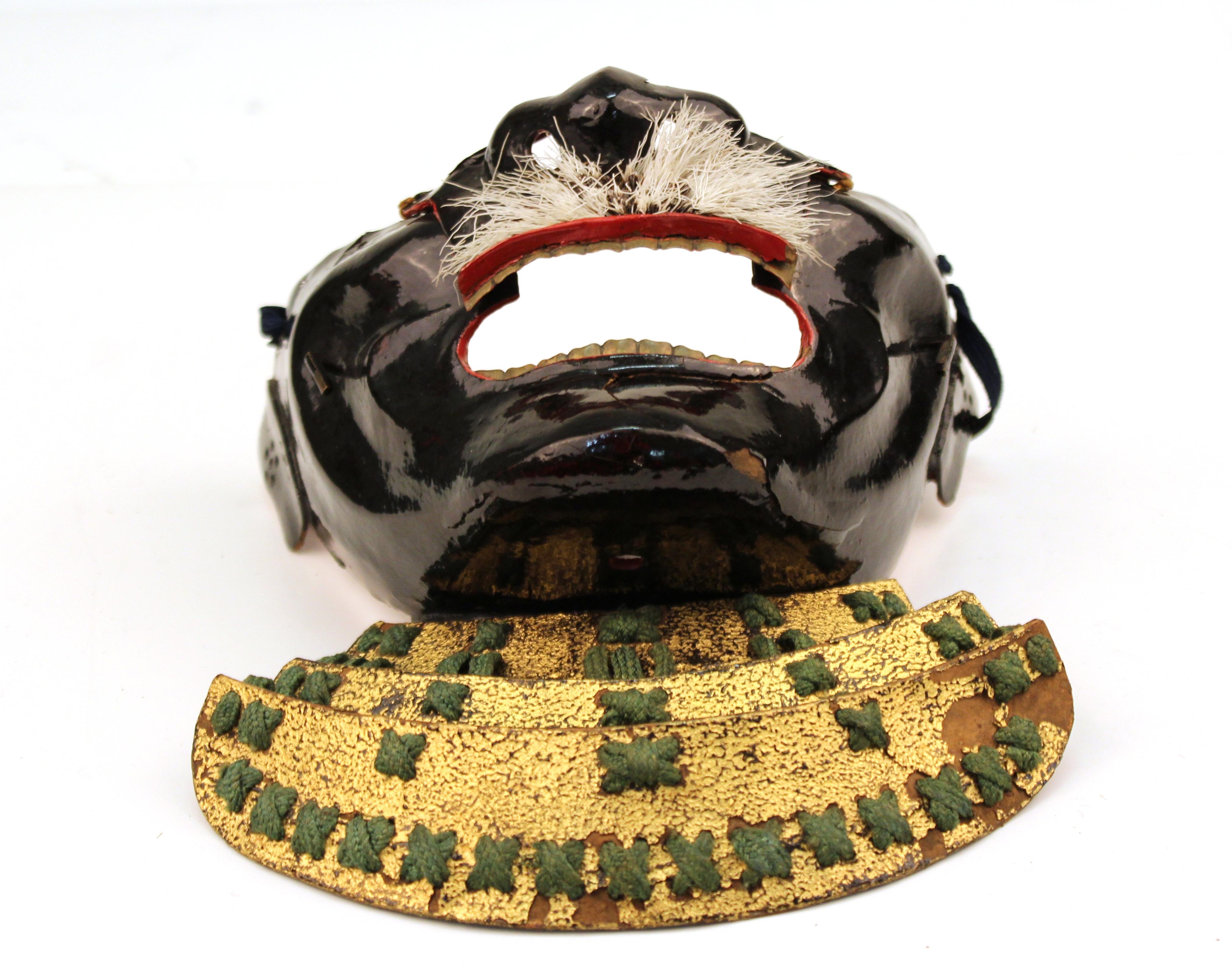 Japanese Edo period samurai half-face mask with mustache. In good vintage condition with age-appropriate wear and patina.