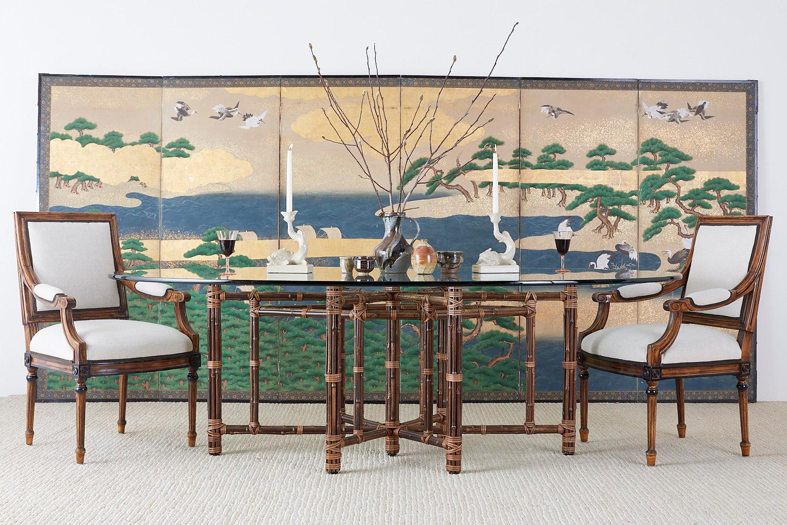 Colorful Japanese late Edo period six-panel screen depicting Hamamatsu sea shore with pine tree groves and cranes. Large format screen ink and color pigments on paper with applied gold leaf and gold flecks. Bountiful blue waves and green foliage