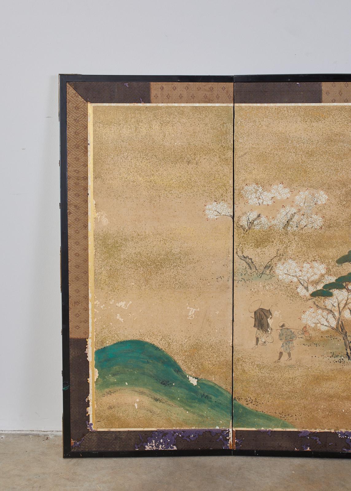 Colorful 18th century Japanese Edo period six-panel screen of a flower viewing party. Made in the Maruyama- Shijo school influence. Features figures feasting under flowering cherry Sakura trees. Proverb 