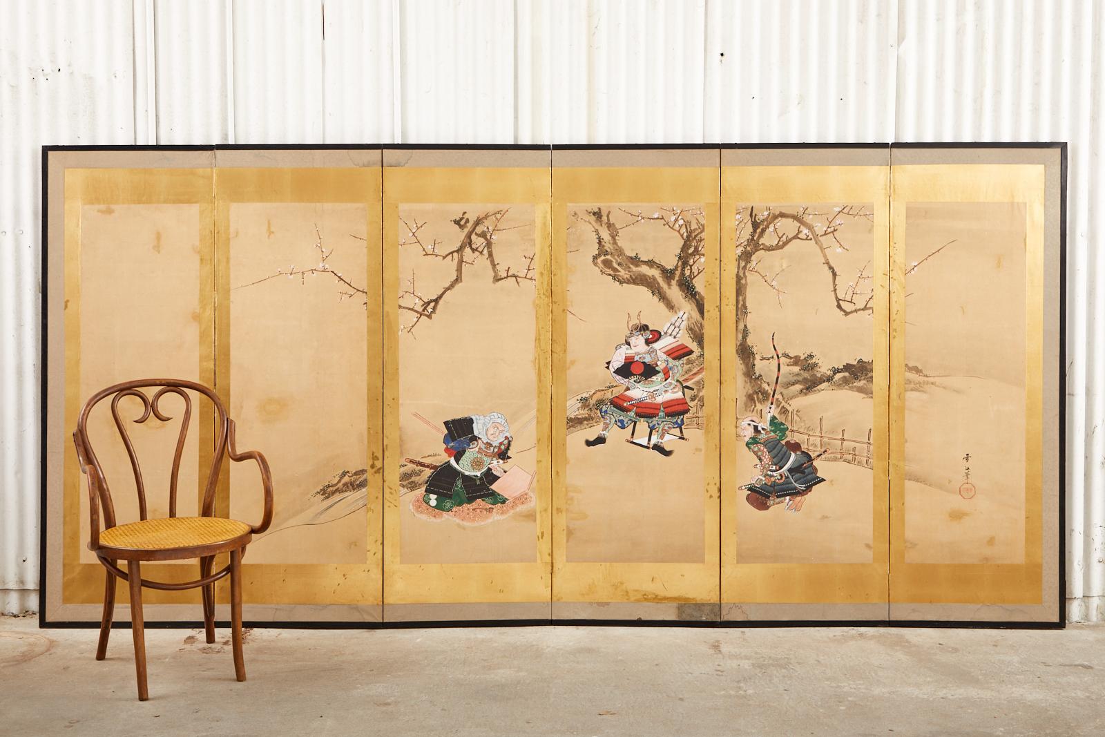 Spectacular 19th century Japanese late Edo period six-panel byobu screen depicting Yoshitsune and Benkei, two heroes of Japanese folklore. Crafted in ink and natural color pigments on mulberry paper with thick gold leaf borders on each panel. The