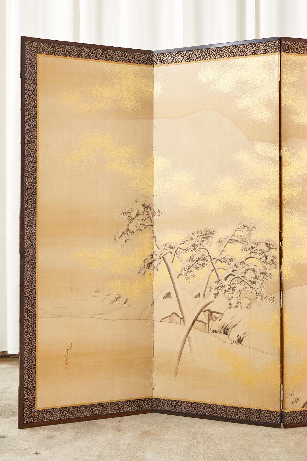 Fantastic early 19th century Japanese Edo period six-panel byobu screen by Yokoyama Seiki (Japanese 1793-1865). This commissioned screen (Oju) made in the Shijo school depicting trees in an idyllic snowy winter landscape. Ink and gold leaf flecks on