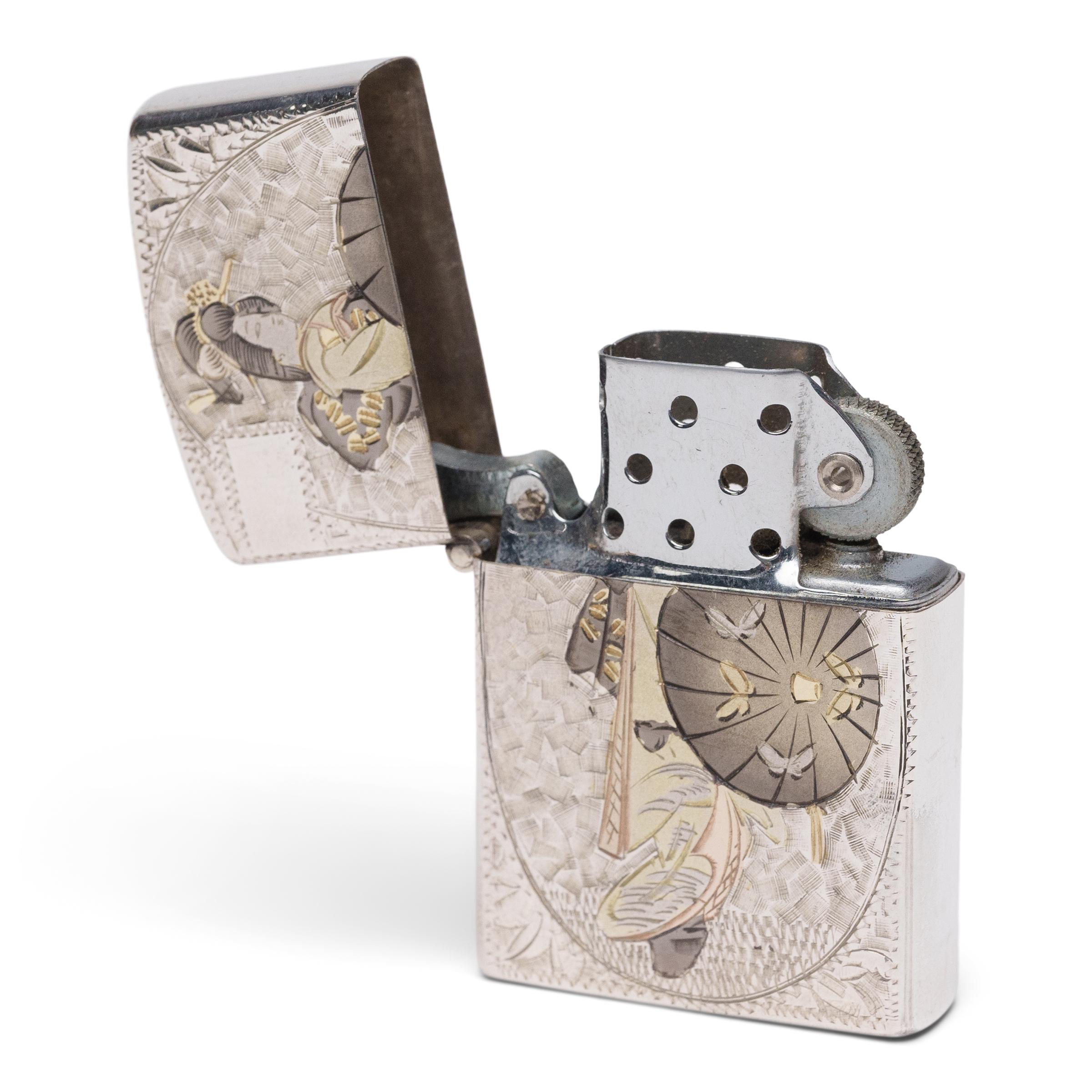 This engraved silver lighter exemplifies Japanese refinement in all crafts. Dated to the mid-20th century, the vintage lighter is decorated with a chased design of a fine lady wearing a traditional kimono and holding a parasol. The opposite side is