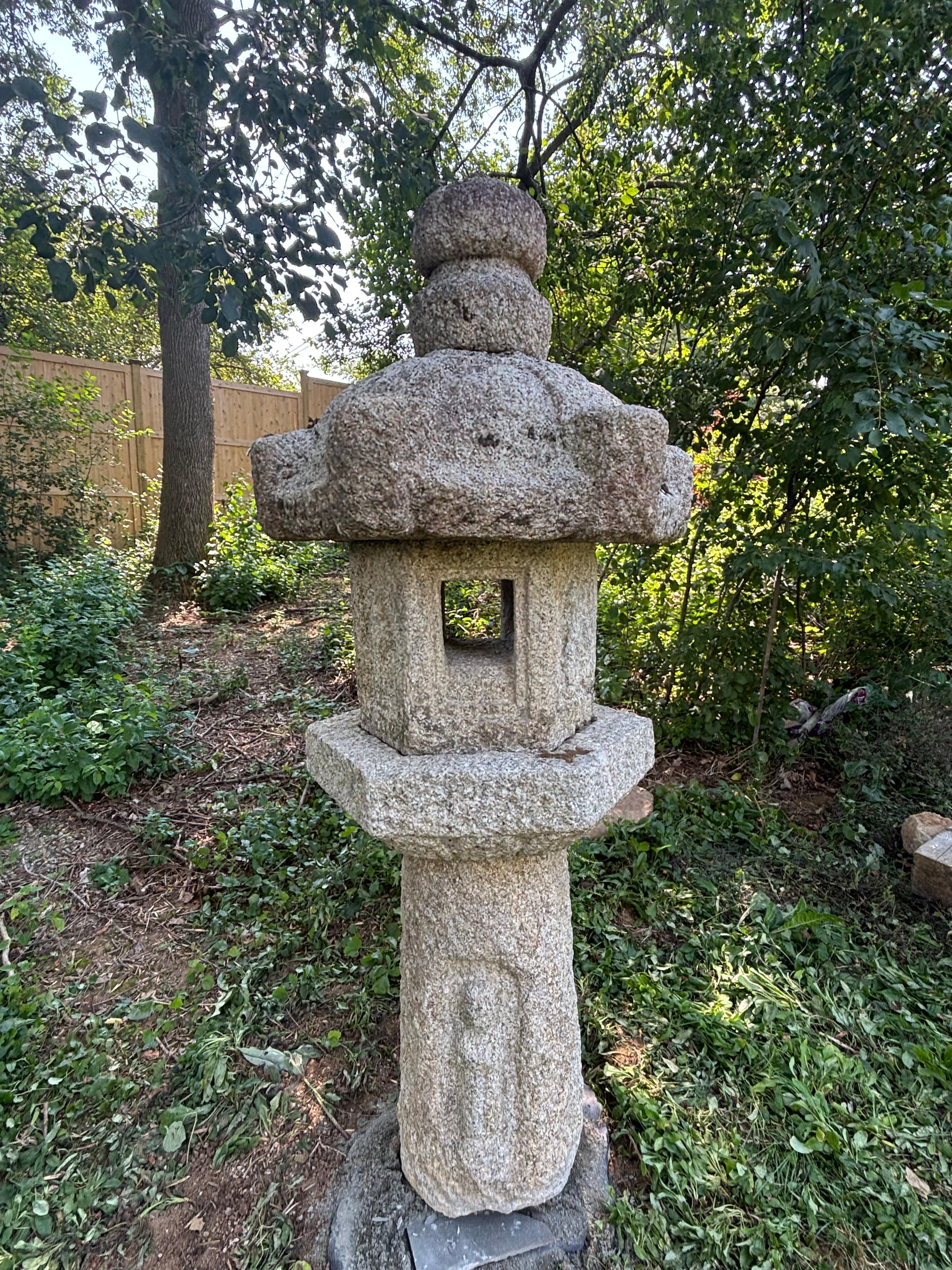 Museum Piece.   

Please view our video.

Call or message us for additional details. 

Japan, an early “Buddhist” granite stone lantern with weathering from great age, and dating to the 18th/19th century. This is a classic tea master lantern style